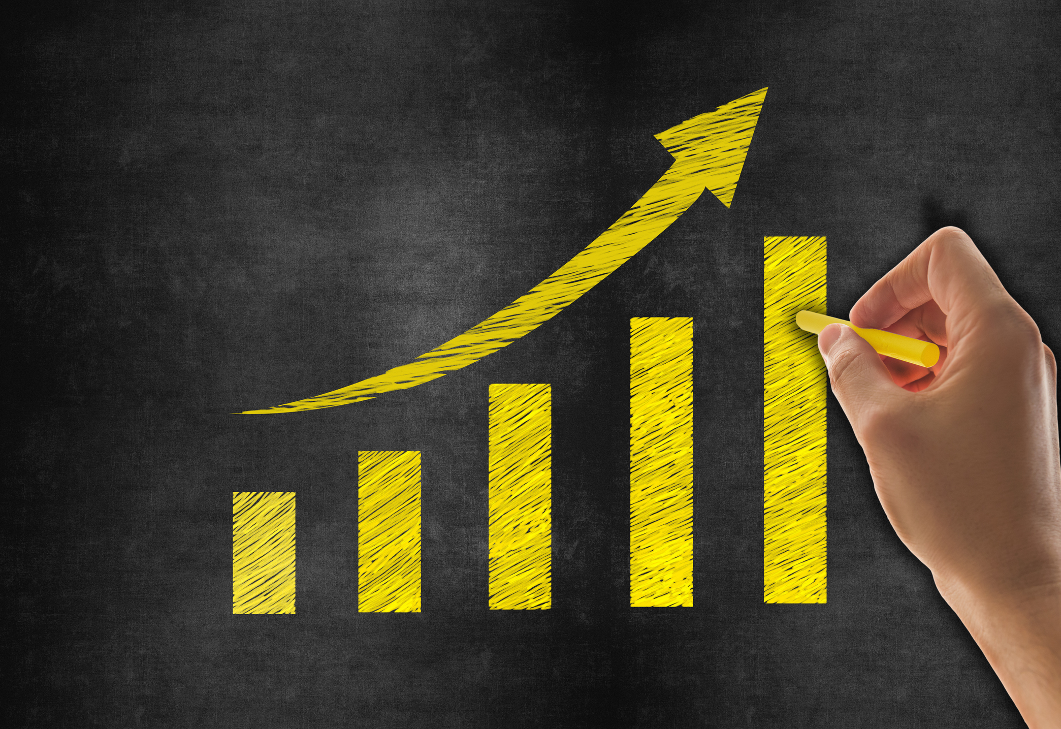 Hand drawn graph on blackboard illustrating slow but steady growth