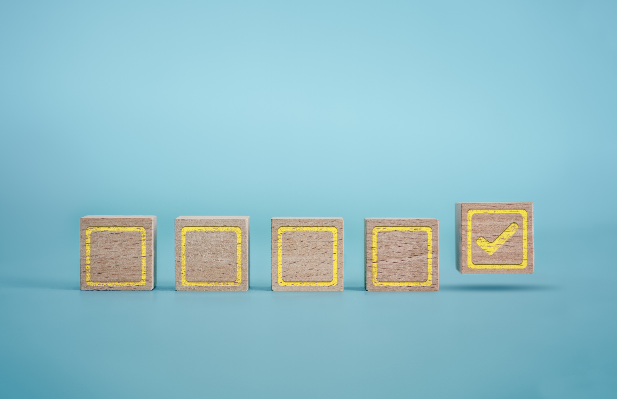 Wooden blocks with empty checkboxes