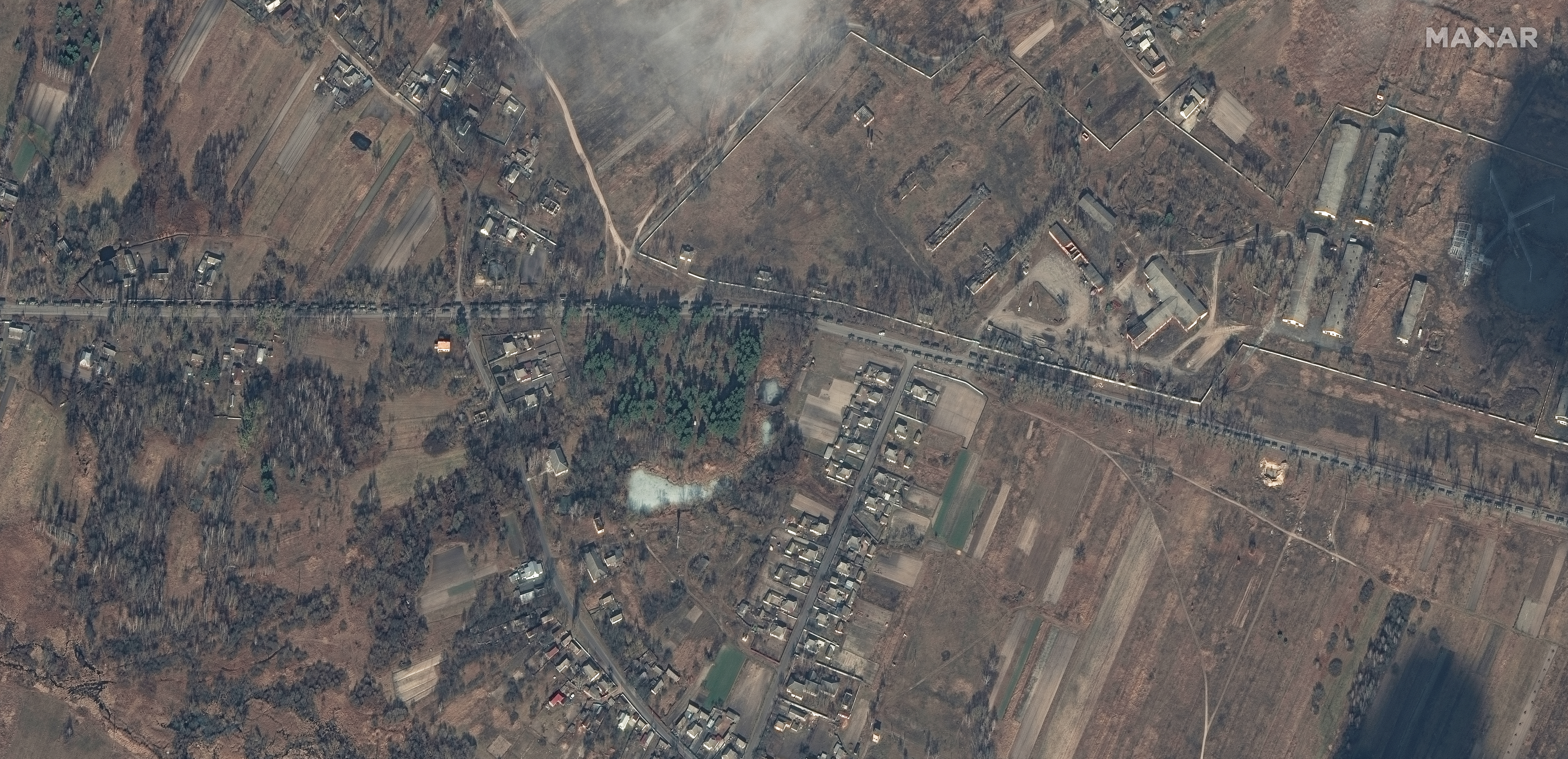 A large deployment of Russian ground forces, containing hundreds of military vehicles, are seen in convoy northeast of Ivankiv, Ukraine