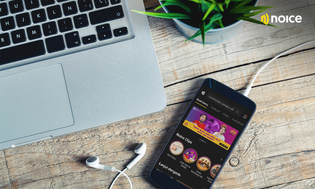 Photo of a smartphone displaying Indonesian audio content NOICE's app