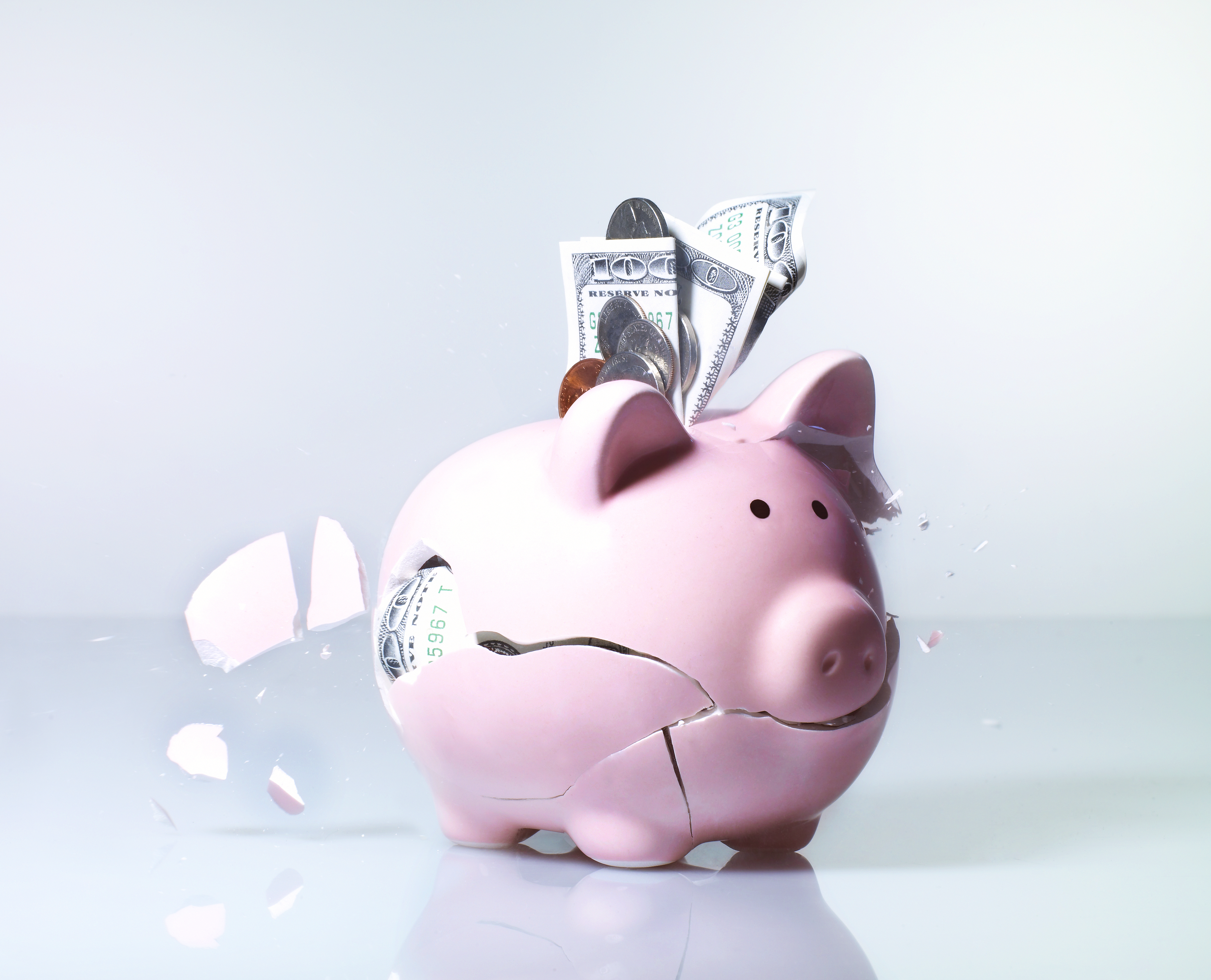 Piggy bank exploding, close-up