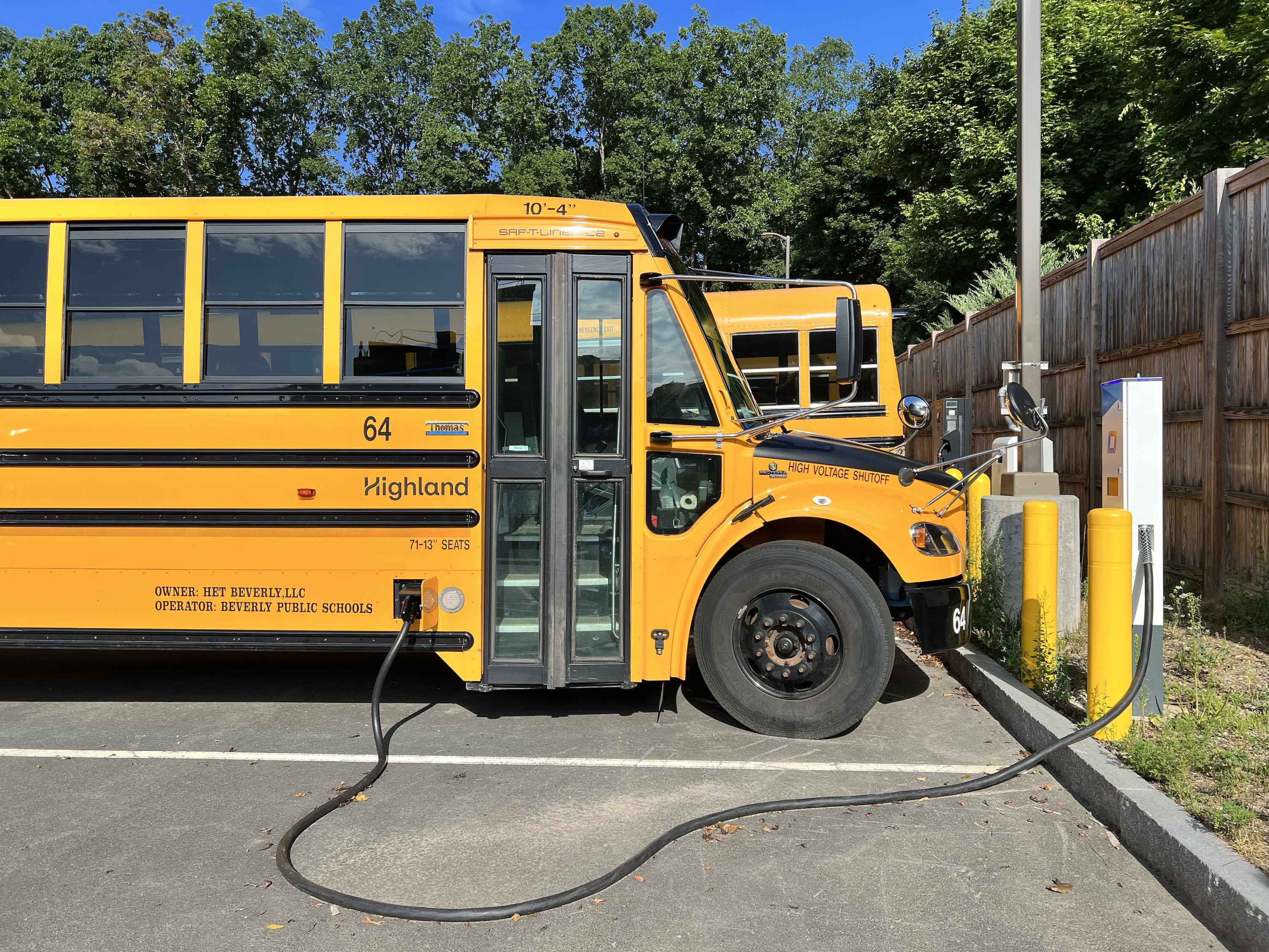 A school bus connected to a V2G charger