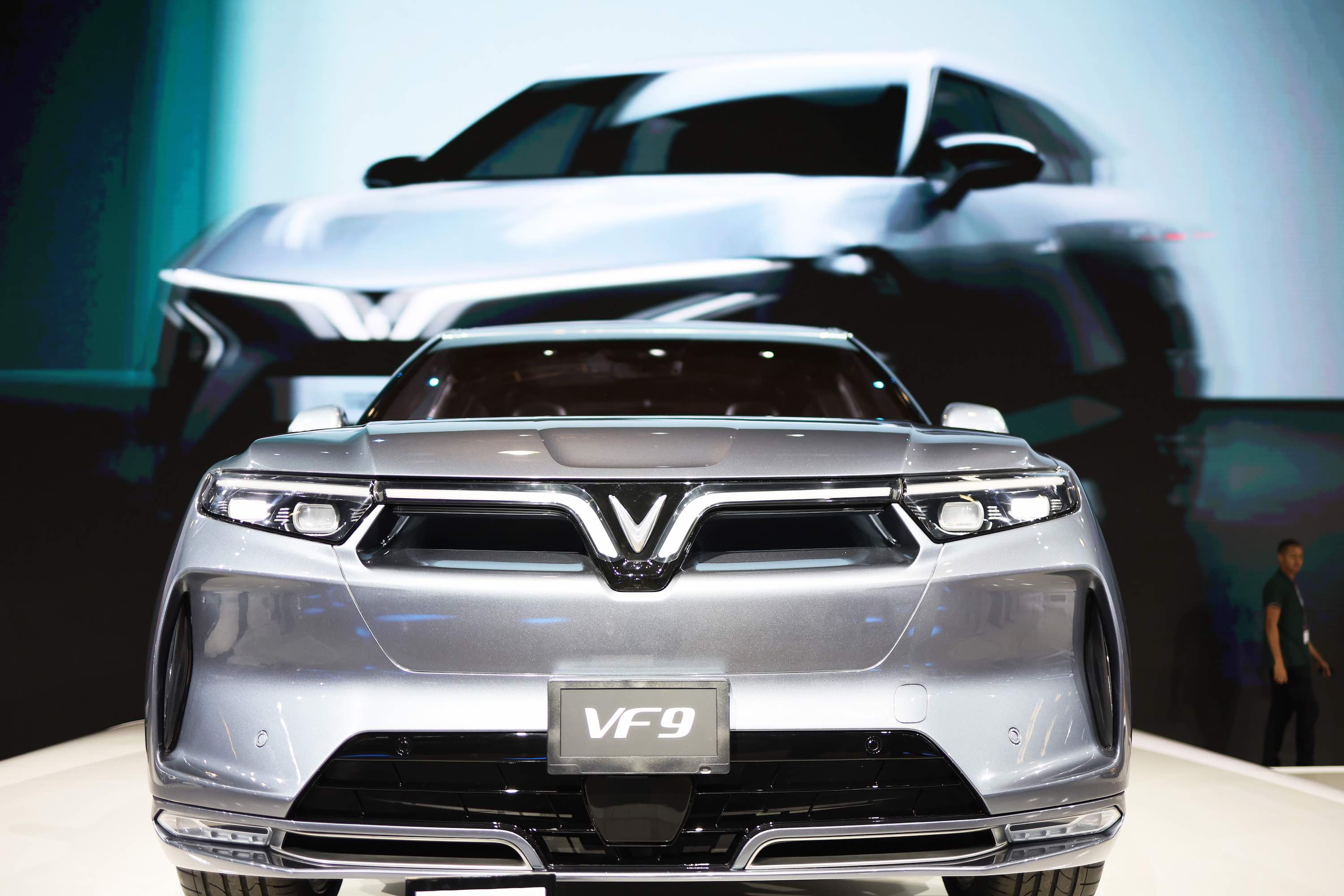 The Vinfast VF9 appears at an auto show.