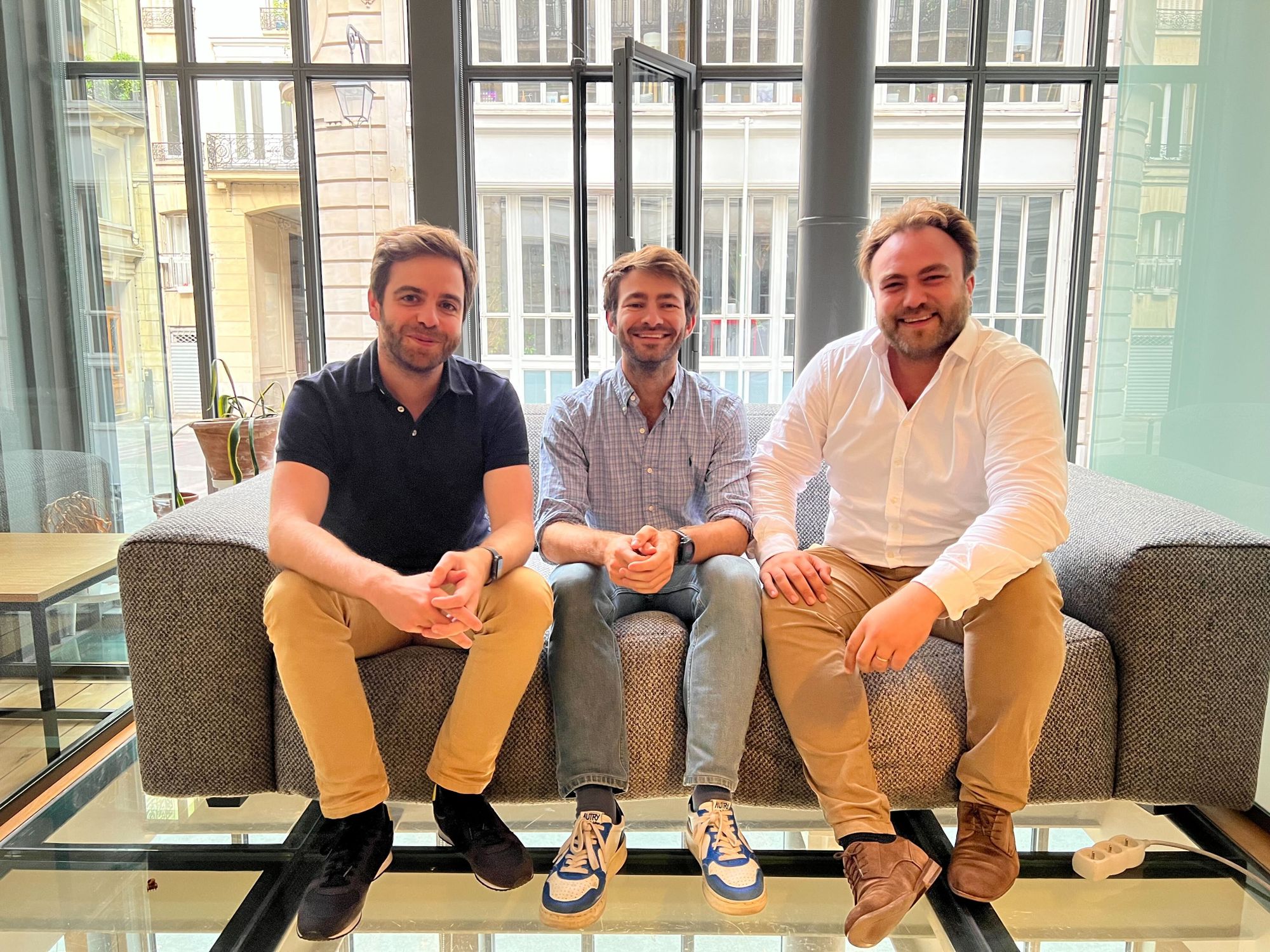 Roundtable founding team sitting on a couch