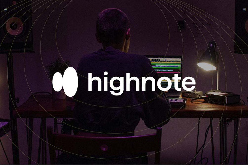 Highnote logo over view from behind of person sitting at laptop