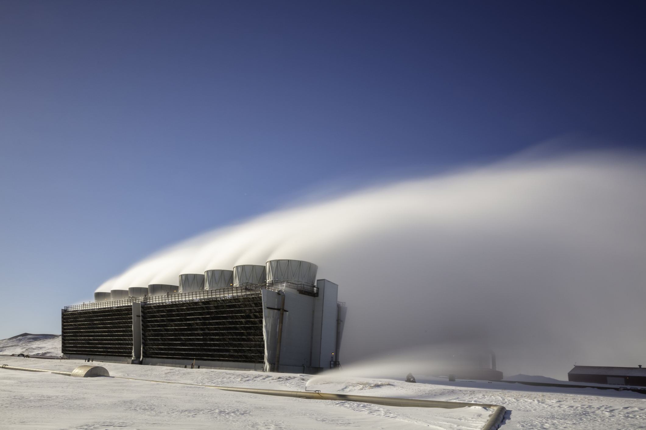 Steam rises off Krafla Geothermal Power Plant in Northern Iceland.