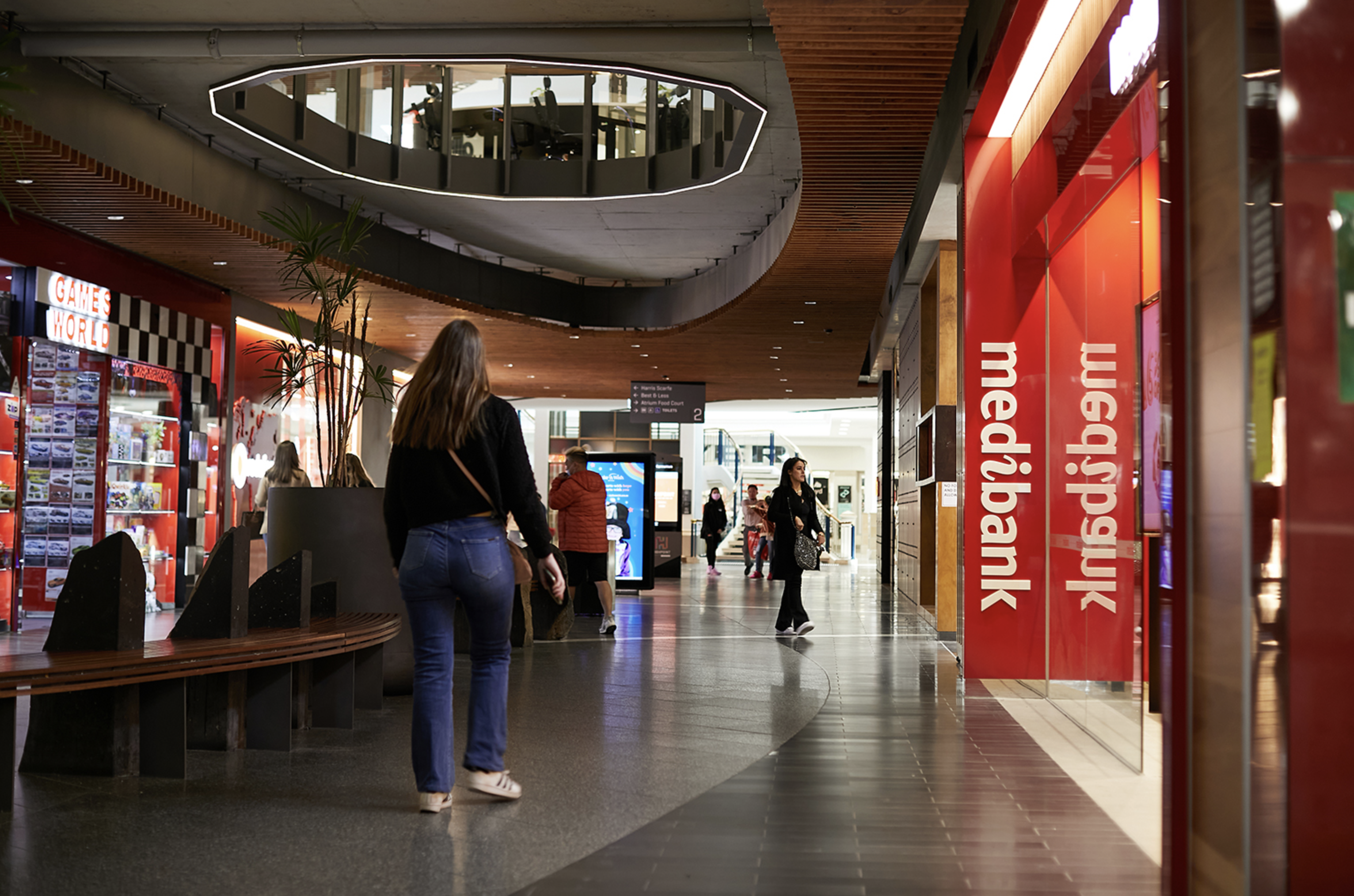 Medibank logo on side of store in a mall