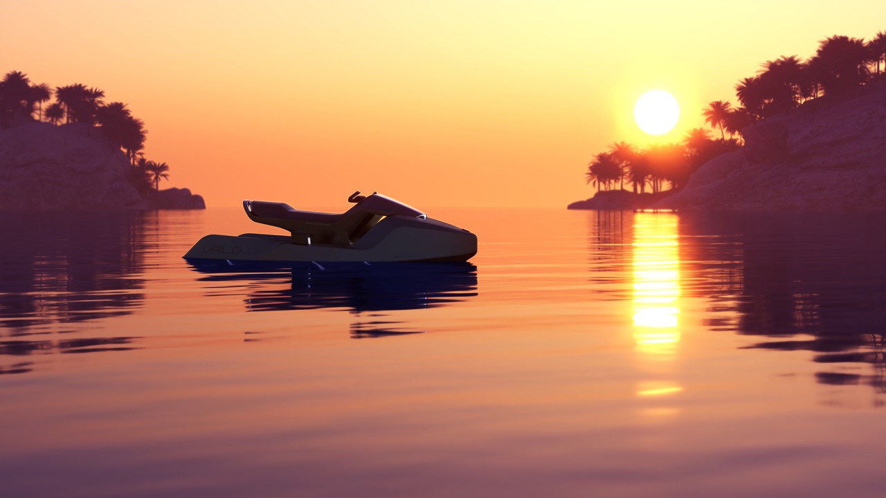riderless personal watercraft sitting on a serene body of water at sunset. or maybe sunrise.