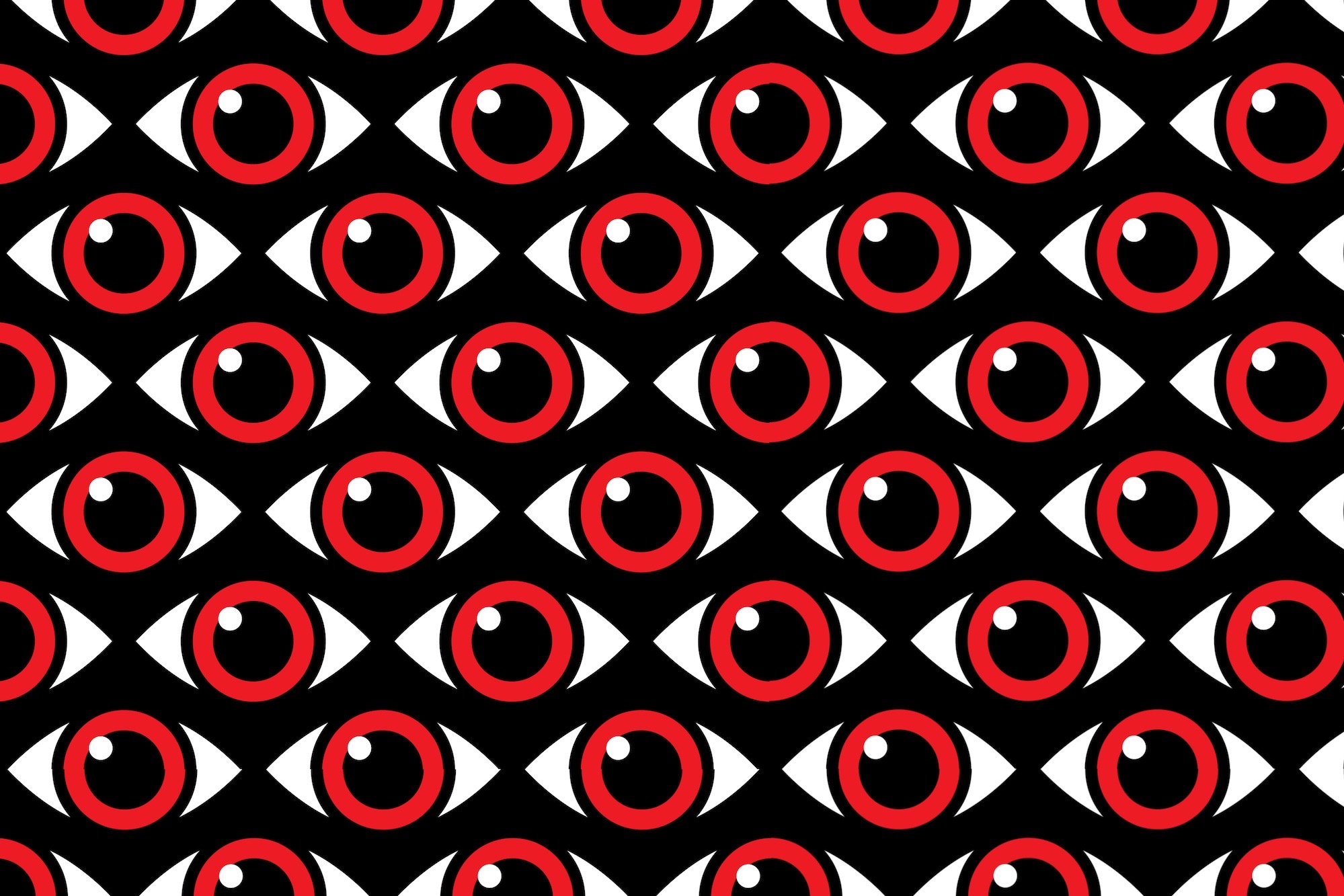Red eyes with a white glint on a patterned black background.