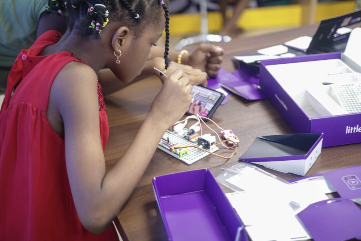 young girl working on a STEM project