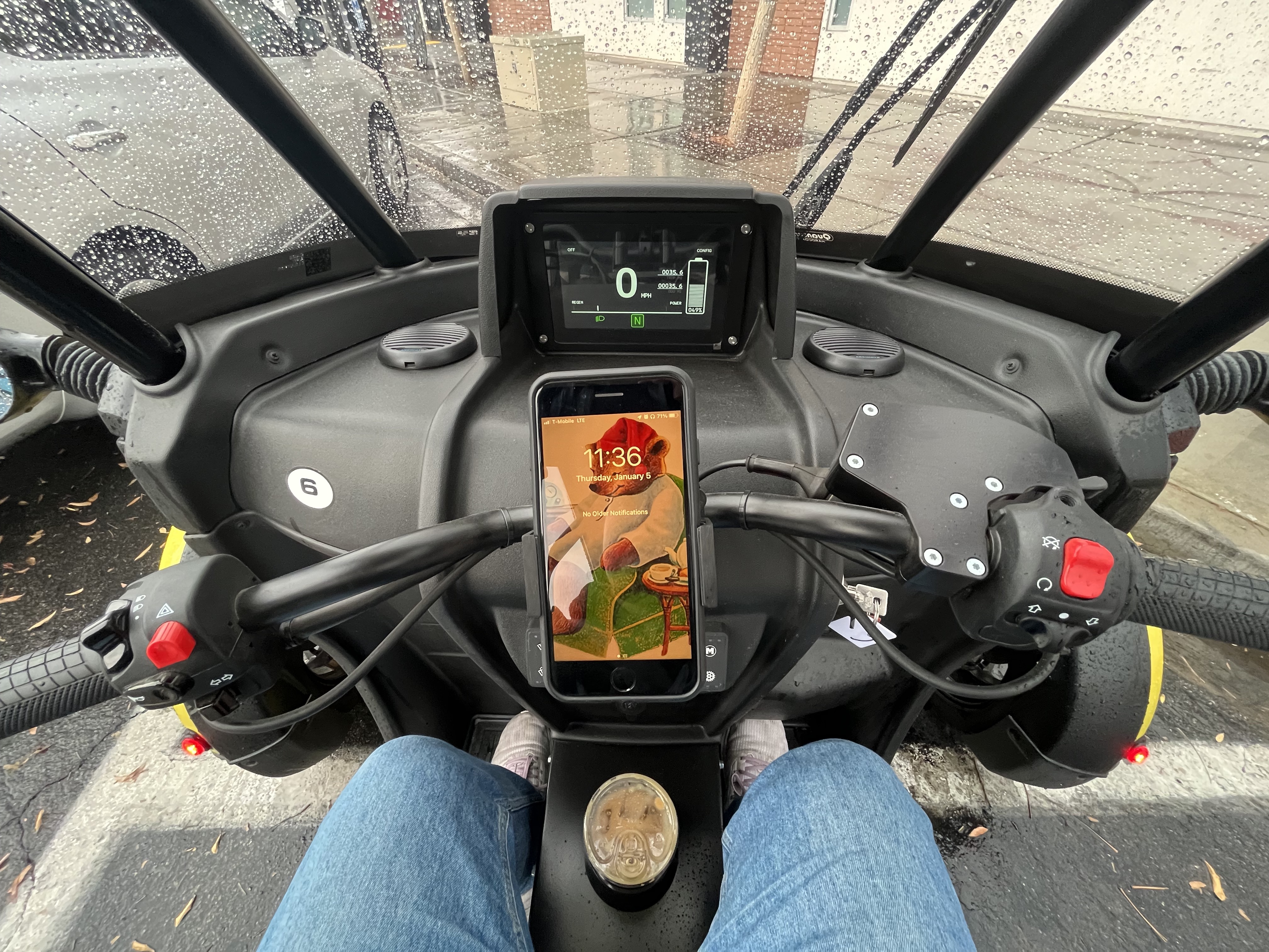 Sitting in Arcimoto's three-wheeled FUV