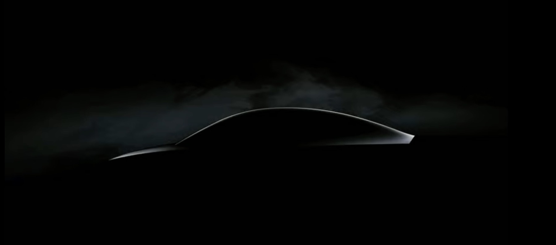 silhouette of new tesla ev teased at the 2023 Tesla annual shareholder meeting