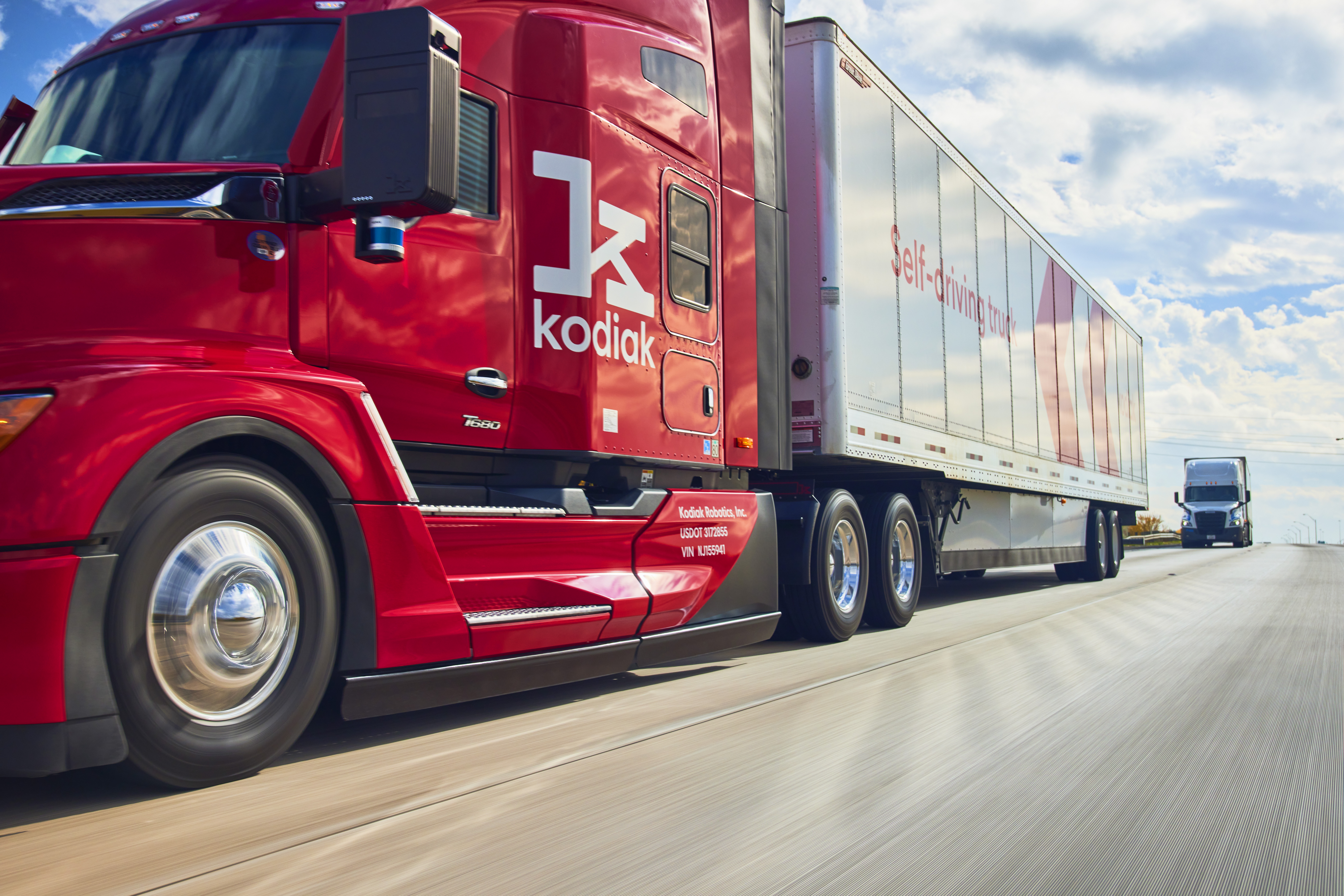 Kodiak Robotics red self-driving truck on highway