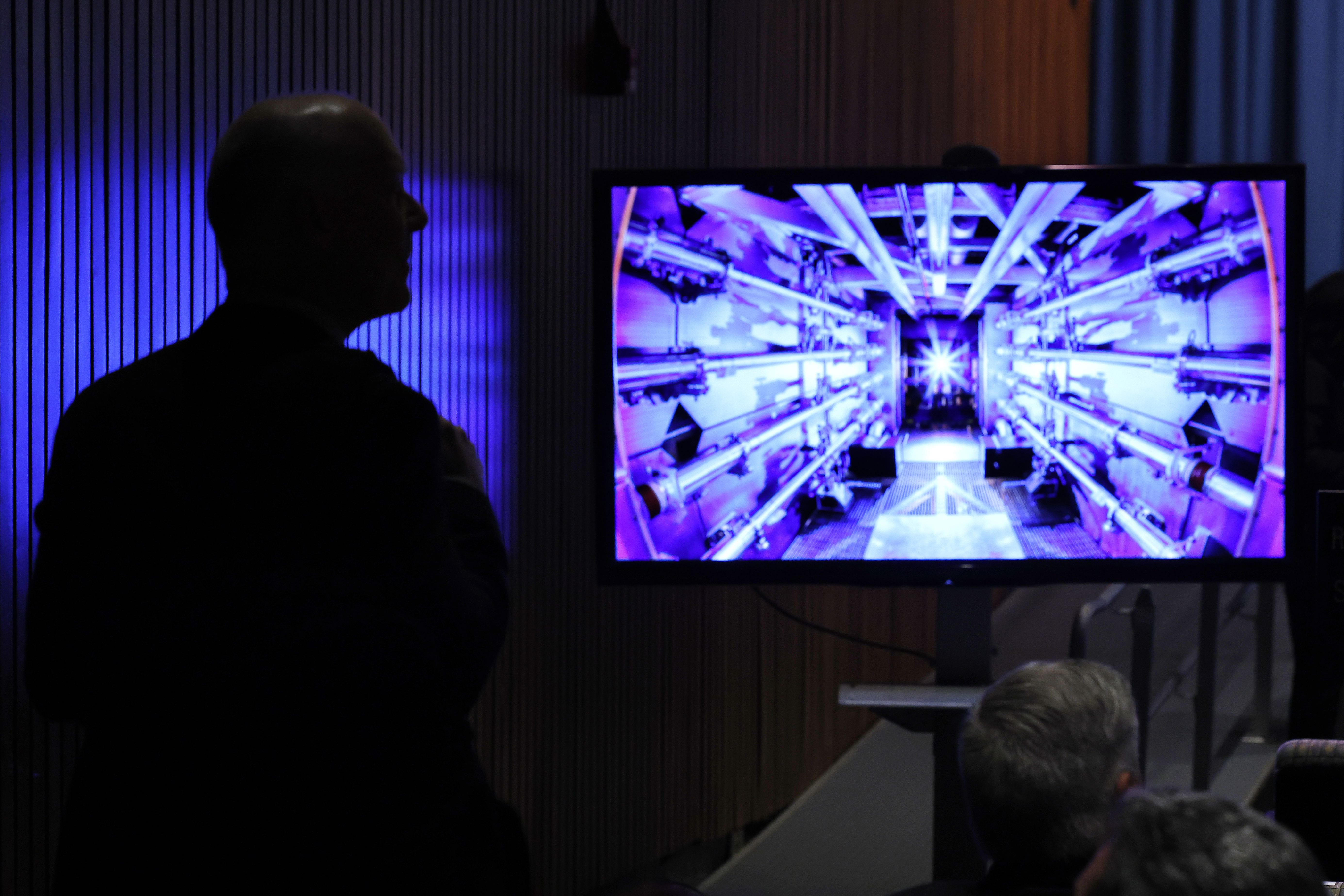 Guests await the beginning of a news conference with U.S. Energy Secretary Jennifer Granholm at the Department of Energy headquarters to announce a breakthrough in fusion research on December 13, 2022 in Washington, DC.