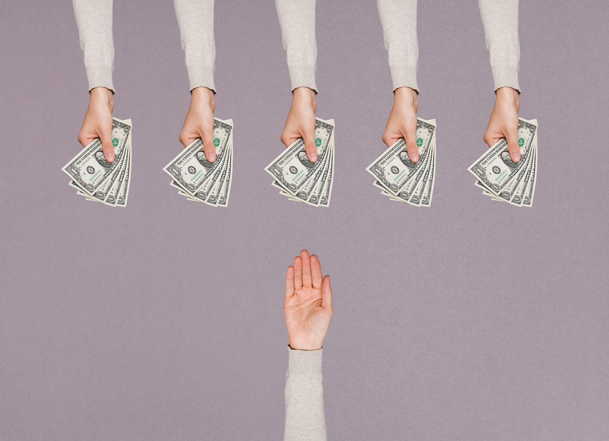 image of five outreached arms with painted nails handing one outstretched arm money