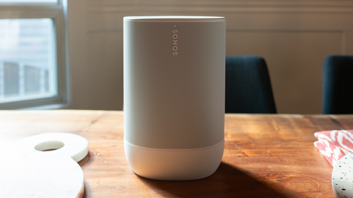 Sonos Move 2 indoors on a wood table, direct front=on view