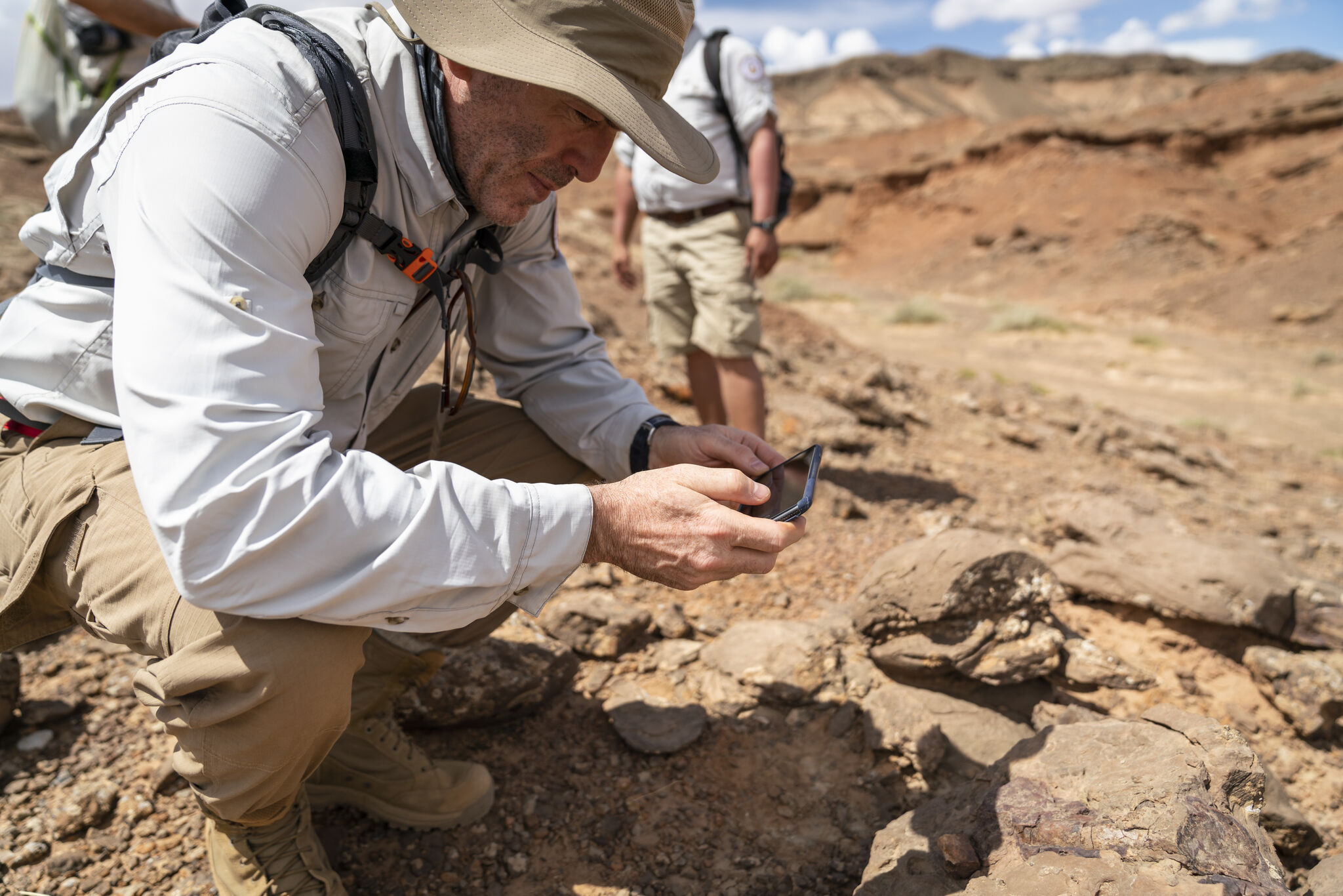 Michael Barth, Voiijer Founder and CEO, hiking in rocky terrain