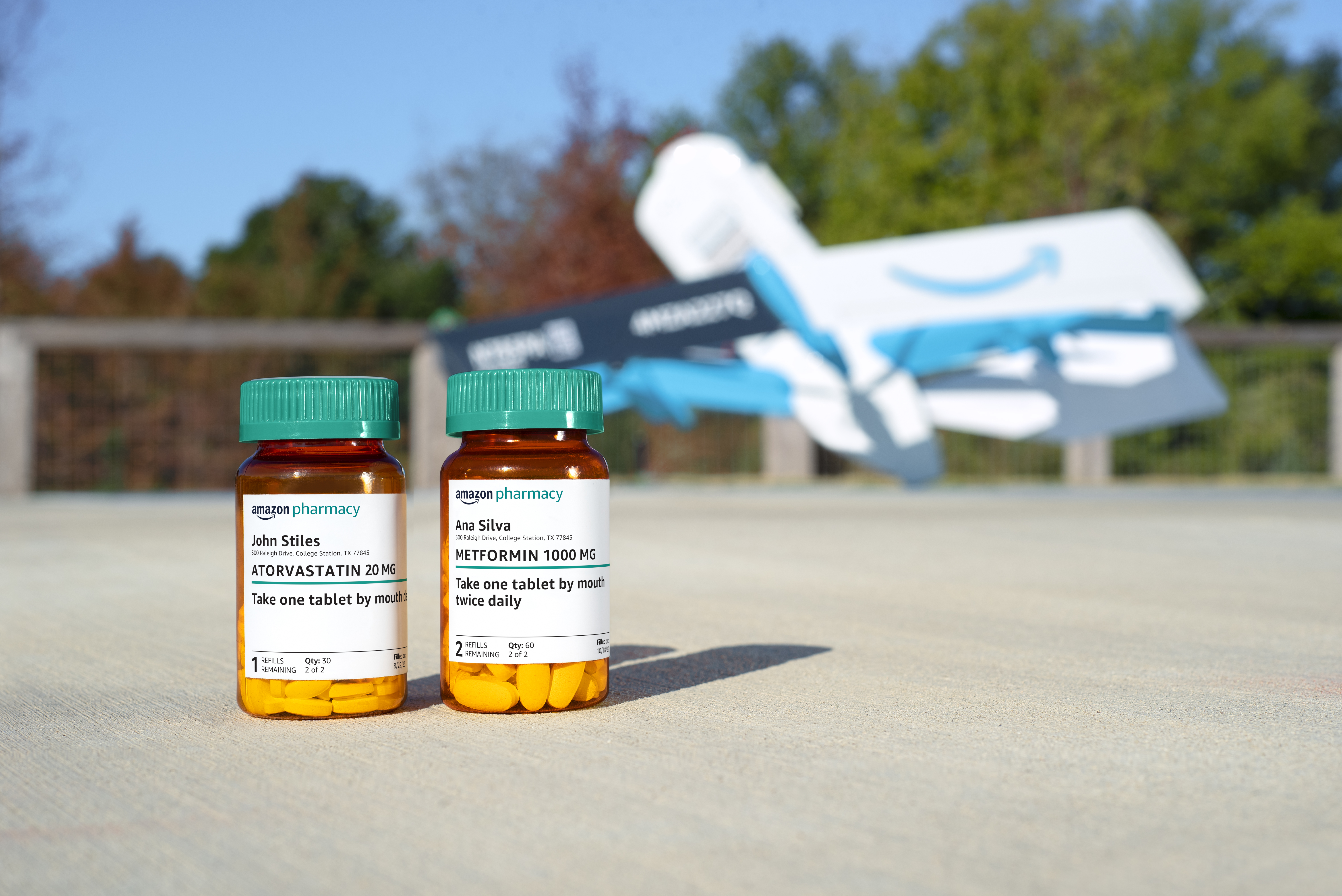 prescription bottles in front of Amazon Pharmacy prime air drone