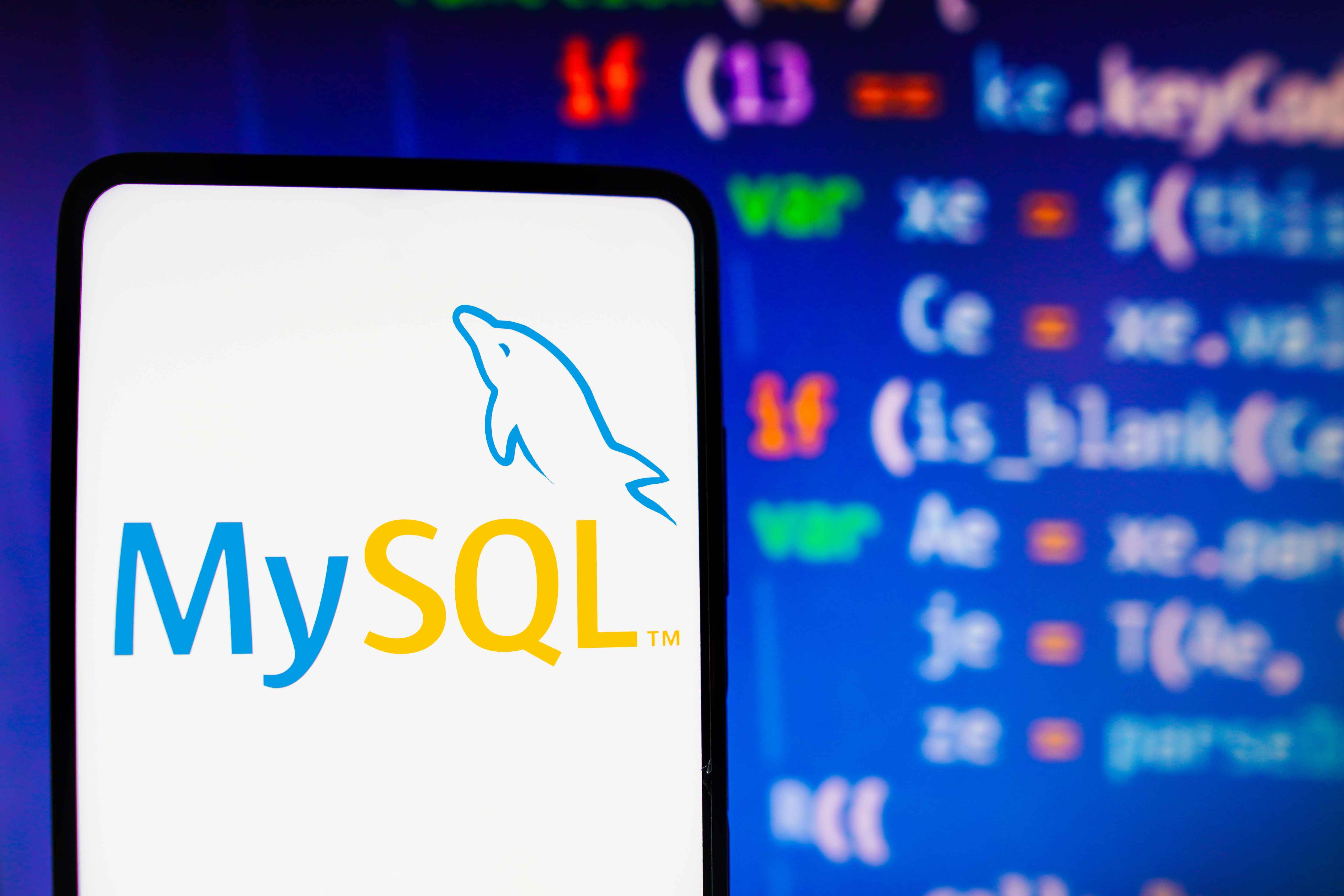 In this photo illustration, the MySQL logo is displayed on a smartphone screen.