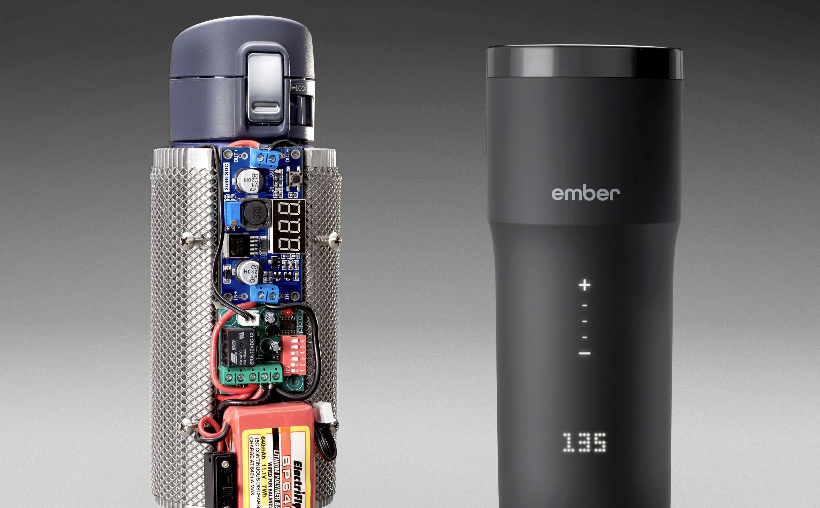 First Ember Mug Prototype from 2012 featured next to Ember's latest 2nd Generation Travel Mug