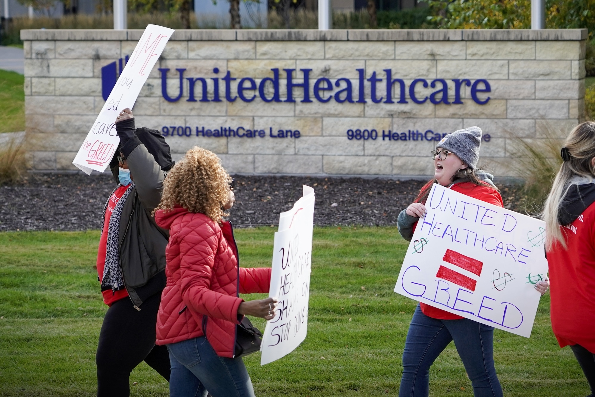 Healthcare advocates with AIDS Healthcare Foundation, from across the United States, protest at the United Healthcare Corporate office in Minnetonka, Minnesota on Tuesday, October 26, 2021