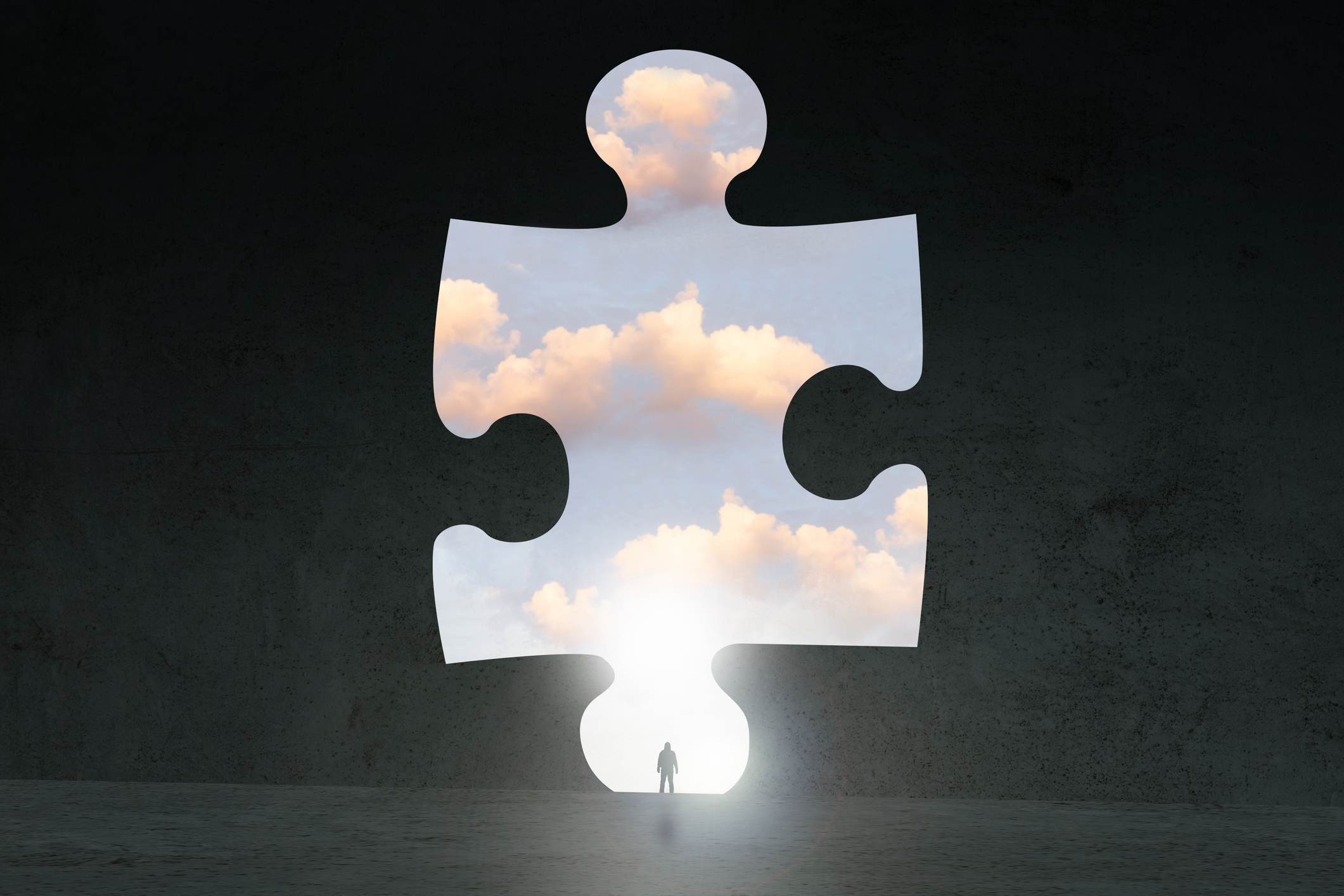 Puzzle piece pulled out to reveal cloud behind it.