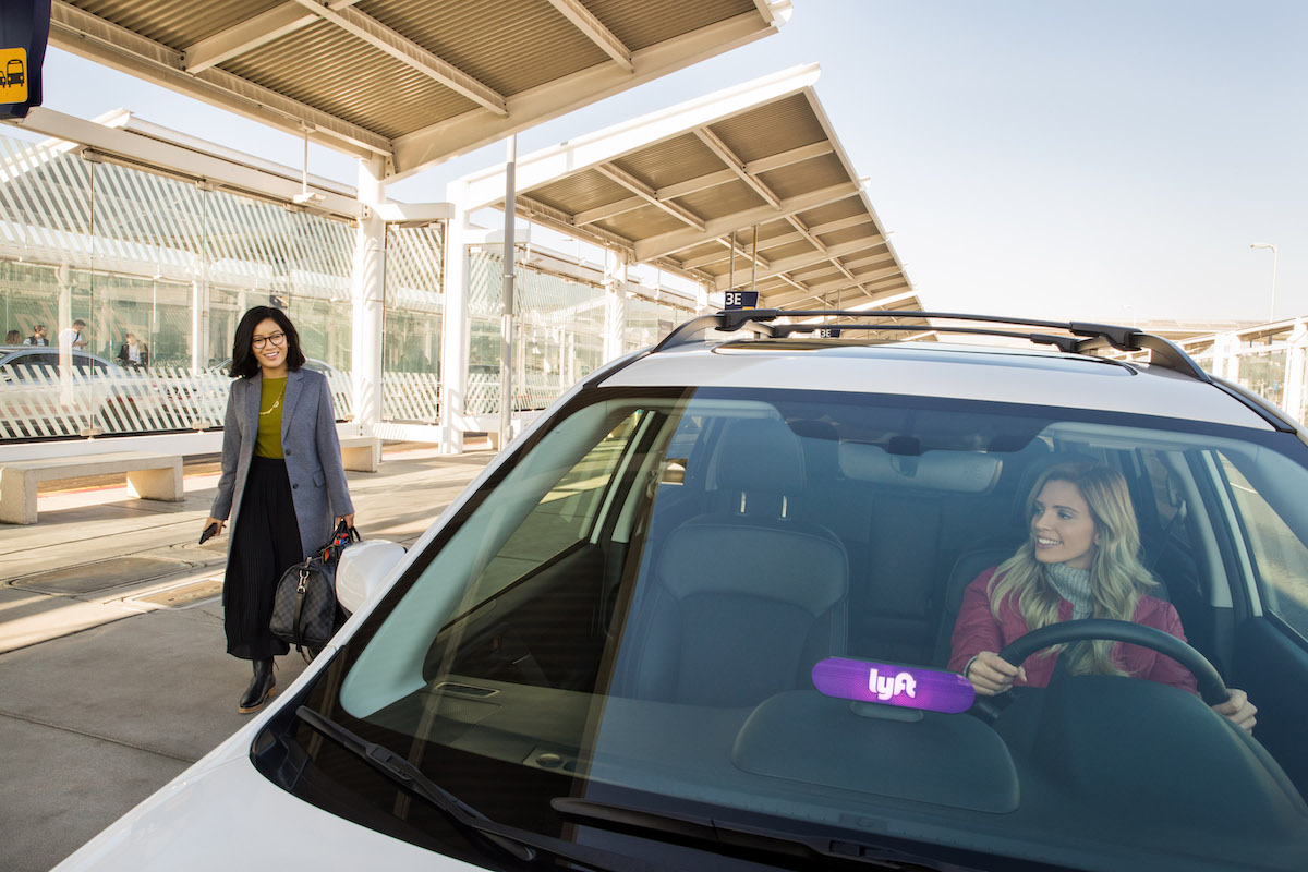 Lyft car picking up rider