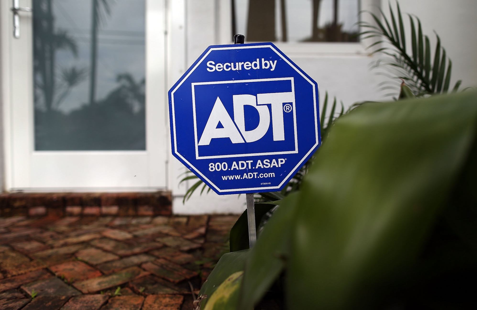 an ADT sign outside someone's house in Miami, Florida