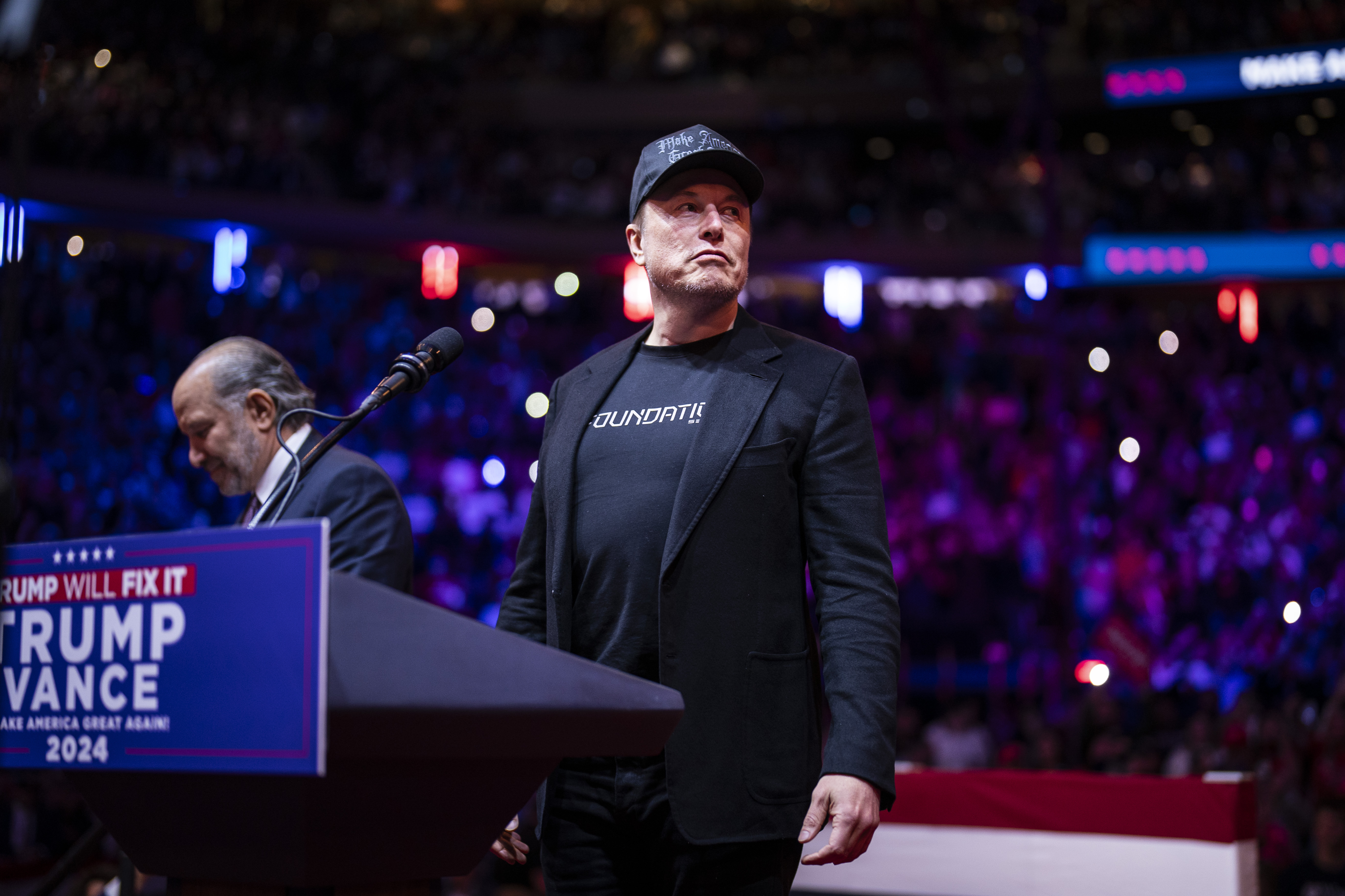 Elon Musk speaks before Republican presidential nominee former President Donald Trump at a campaign rally at Madison Square Garden
