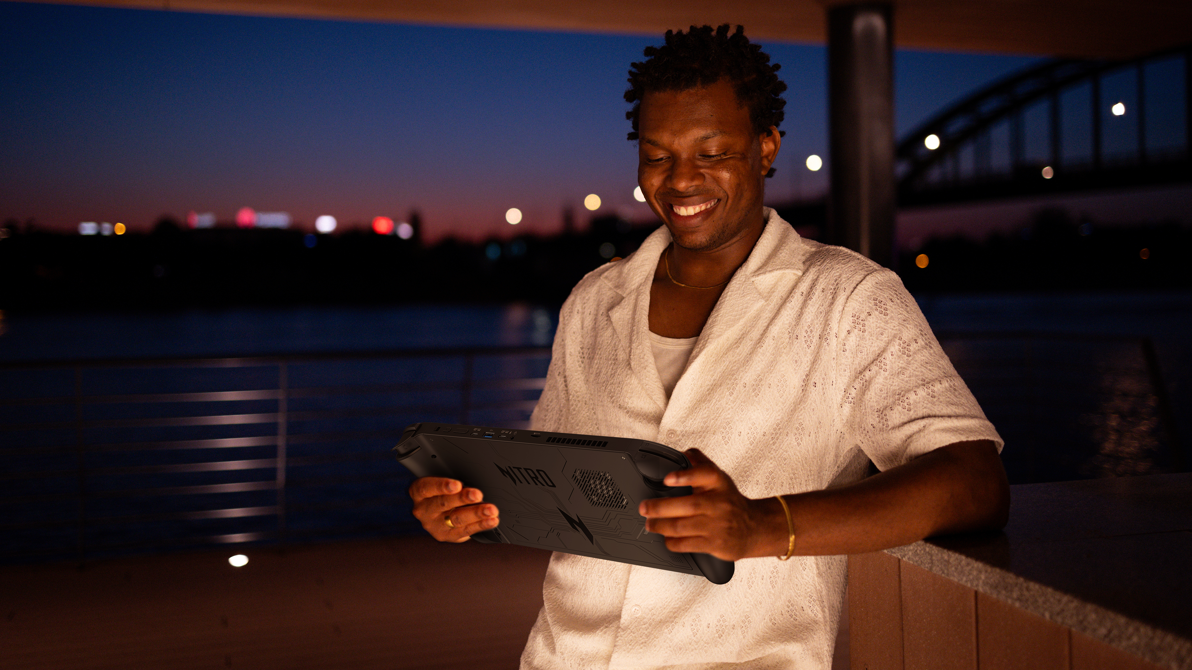 Man playing Acer Nitro Blaze 11