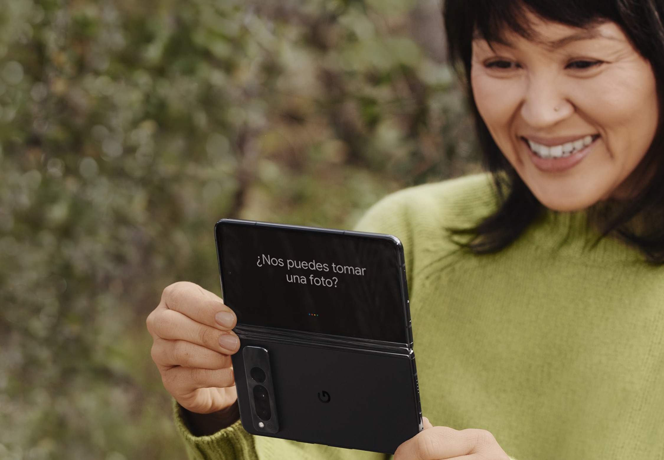 Woman looking at Google Pixel Fold