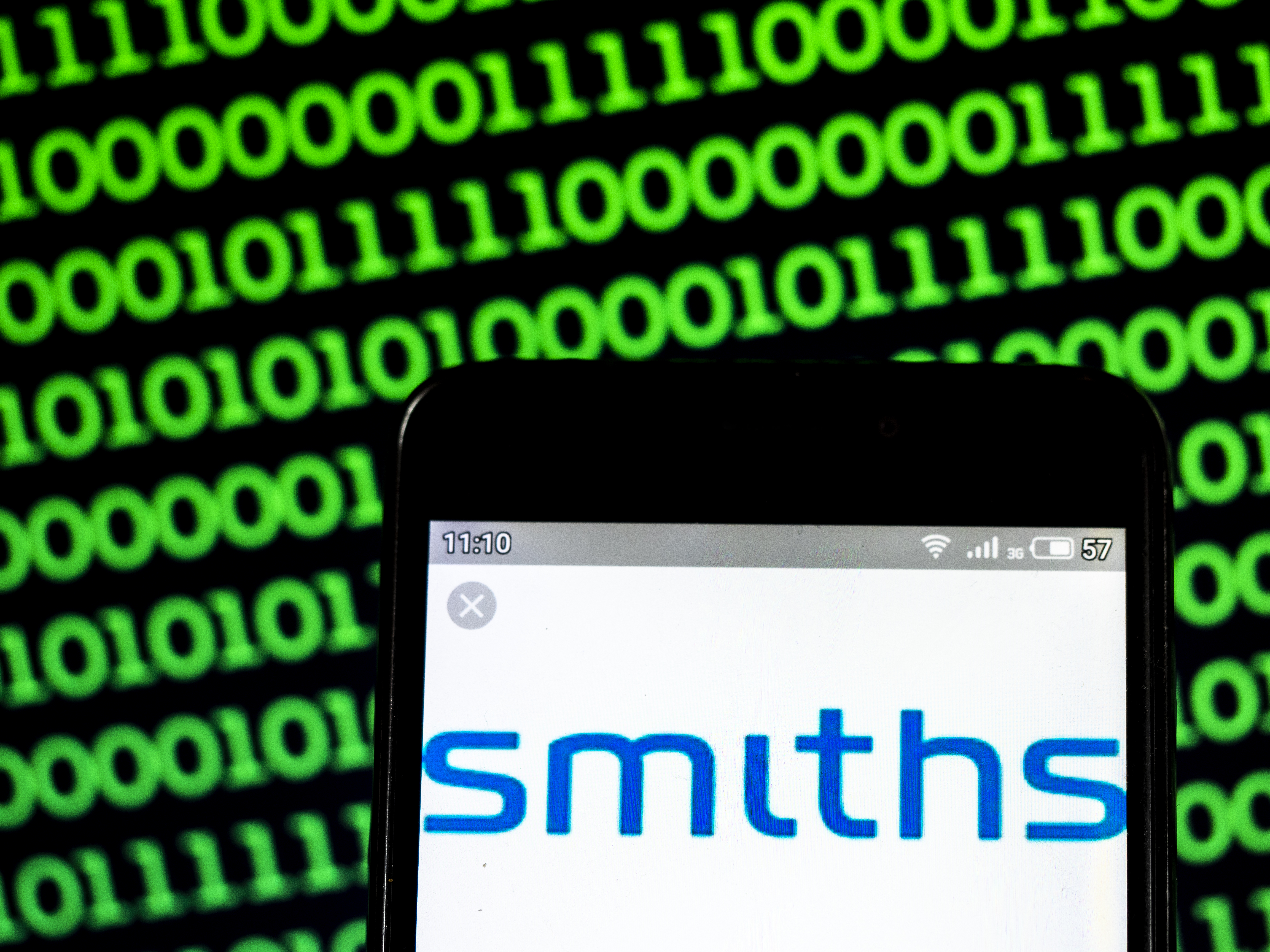 In this photo illustration a Smiths Group plc logo seen displayed on a smart phone.