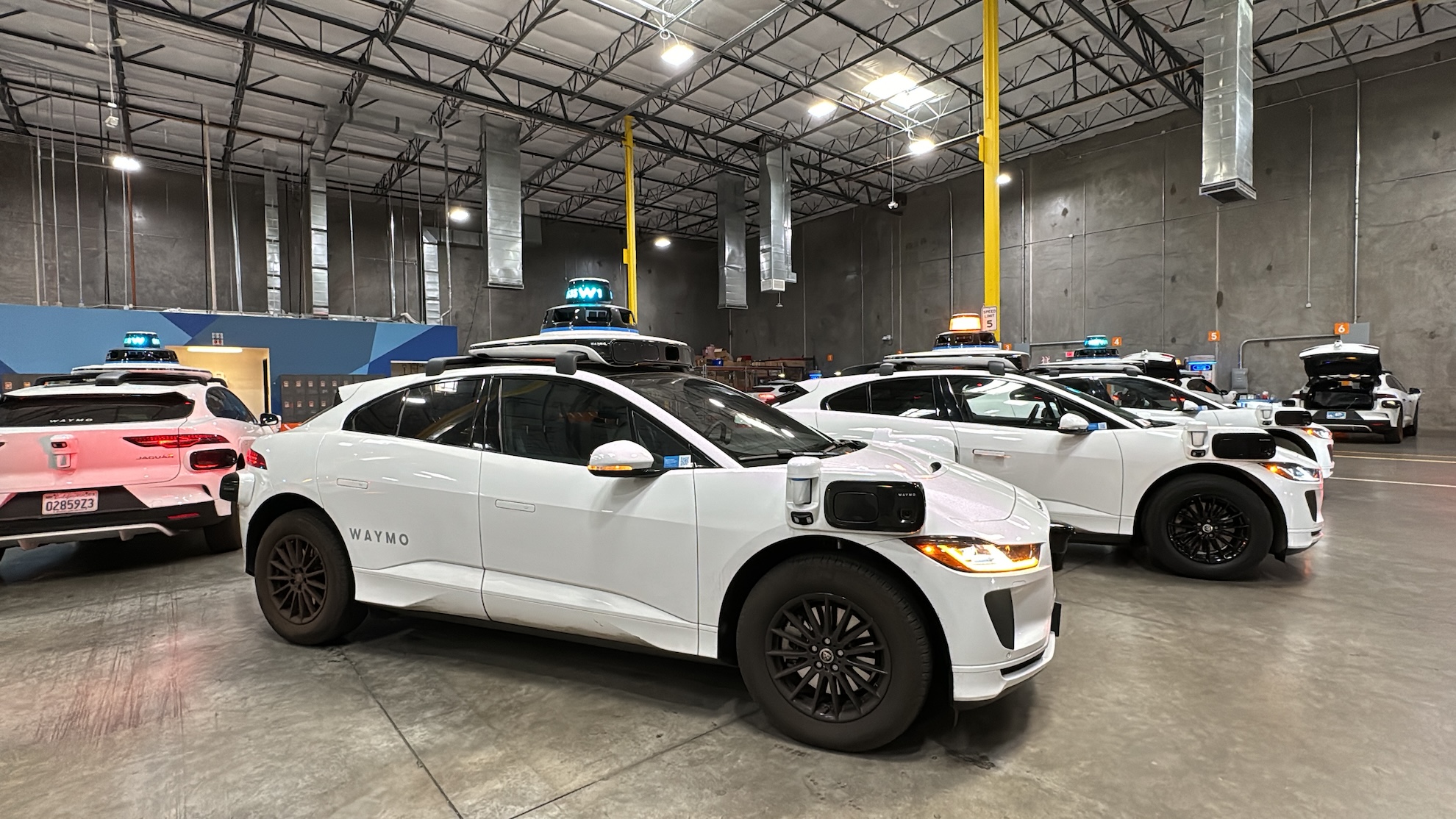 parked Waymo cars