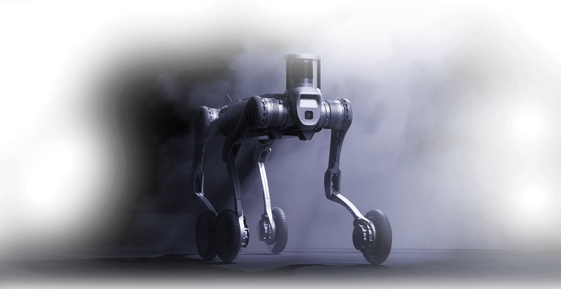 quadropod robot in black coming out of a misty gray background