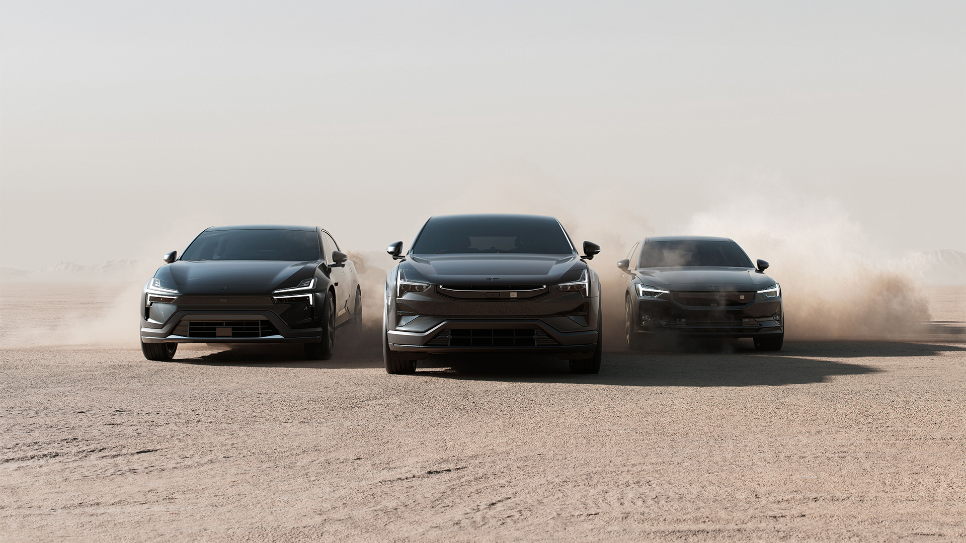 Polestar 2, Polestar 3, and Polestar 4 driving toward camera
