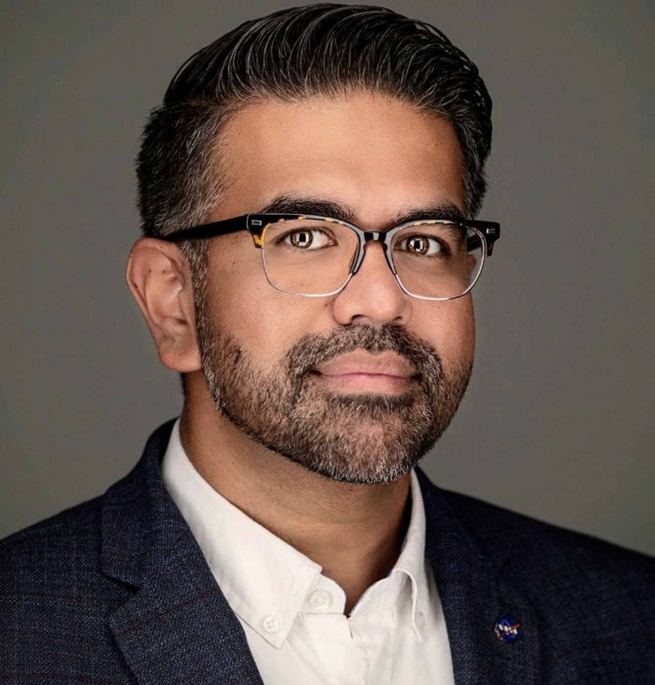 Dr. Richard Munassi