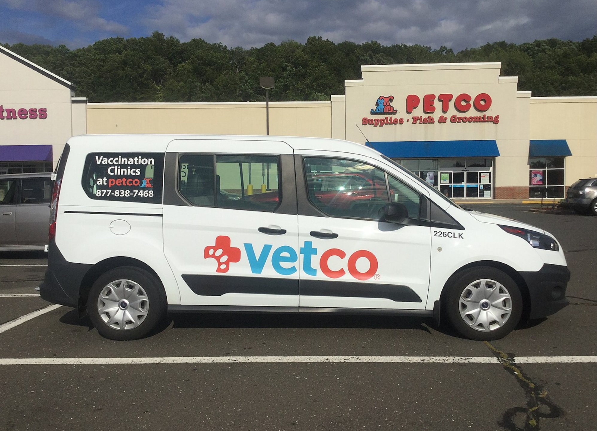 a Vetco van outside of a Petco store
