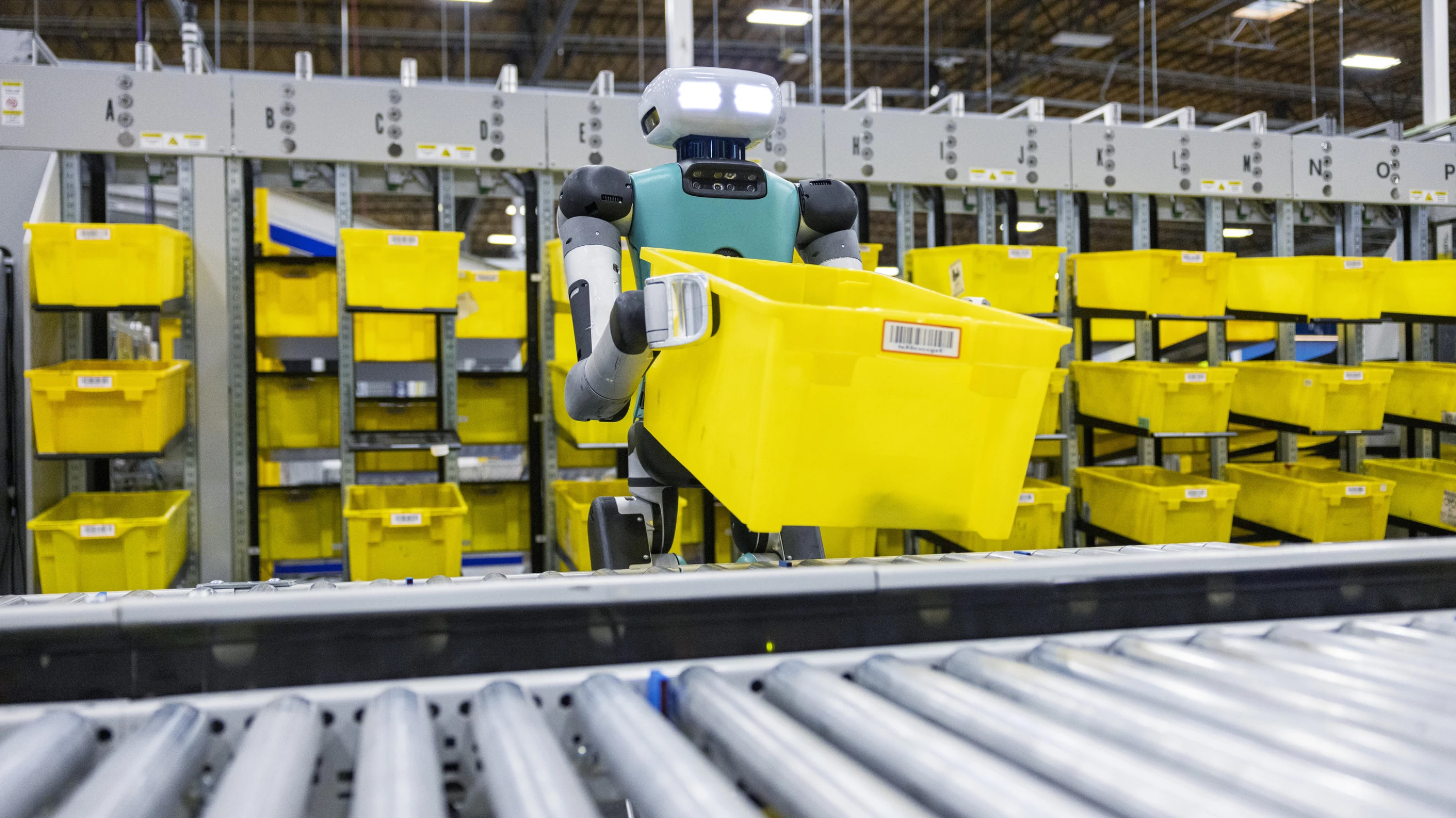 A Digit robot works in an Amazon distribution center.