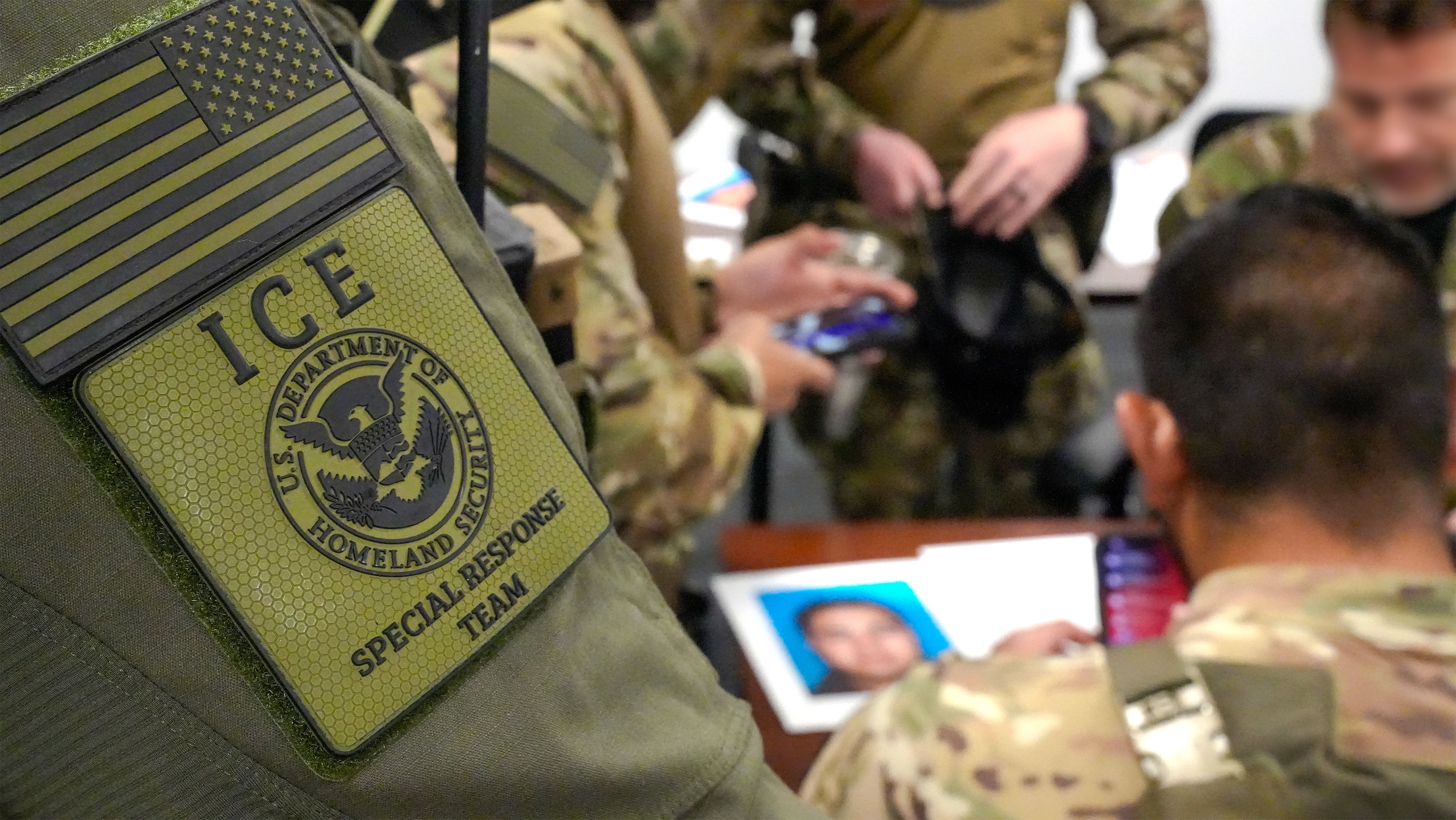 A group of U.S. Immigration and Customs Enforcement (ICE) agents.