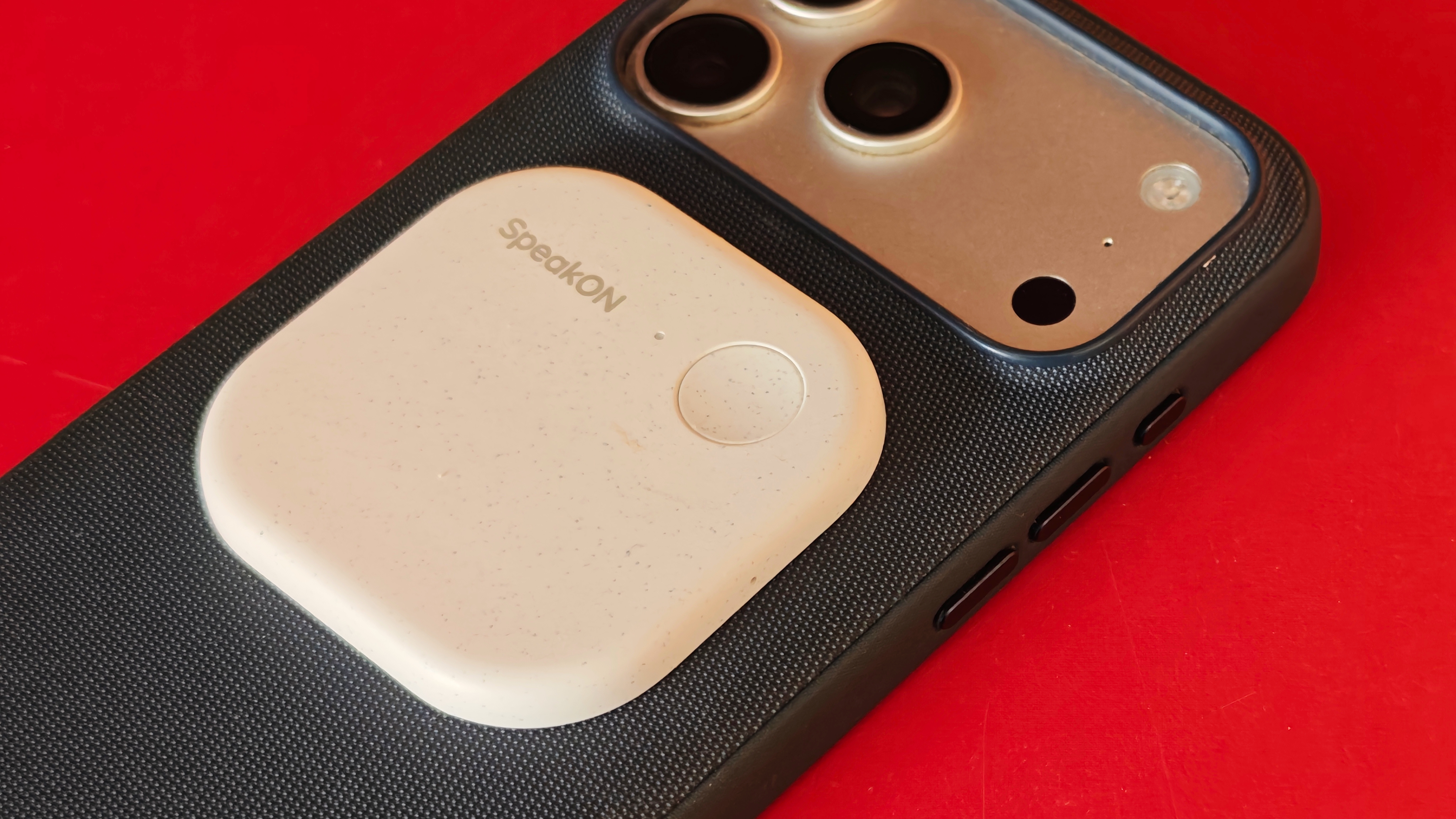 SpeakON device on back of iPhone