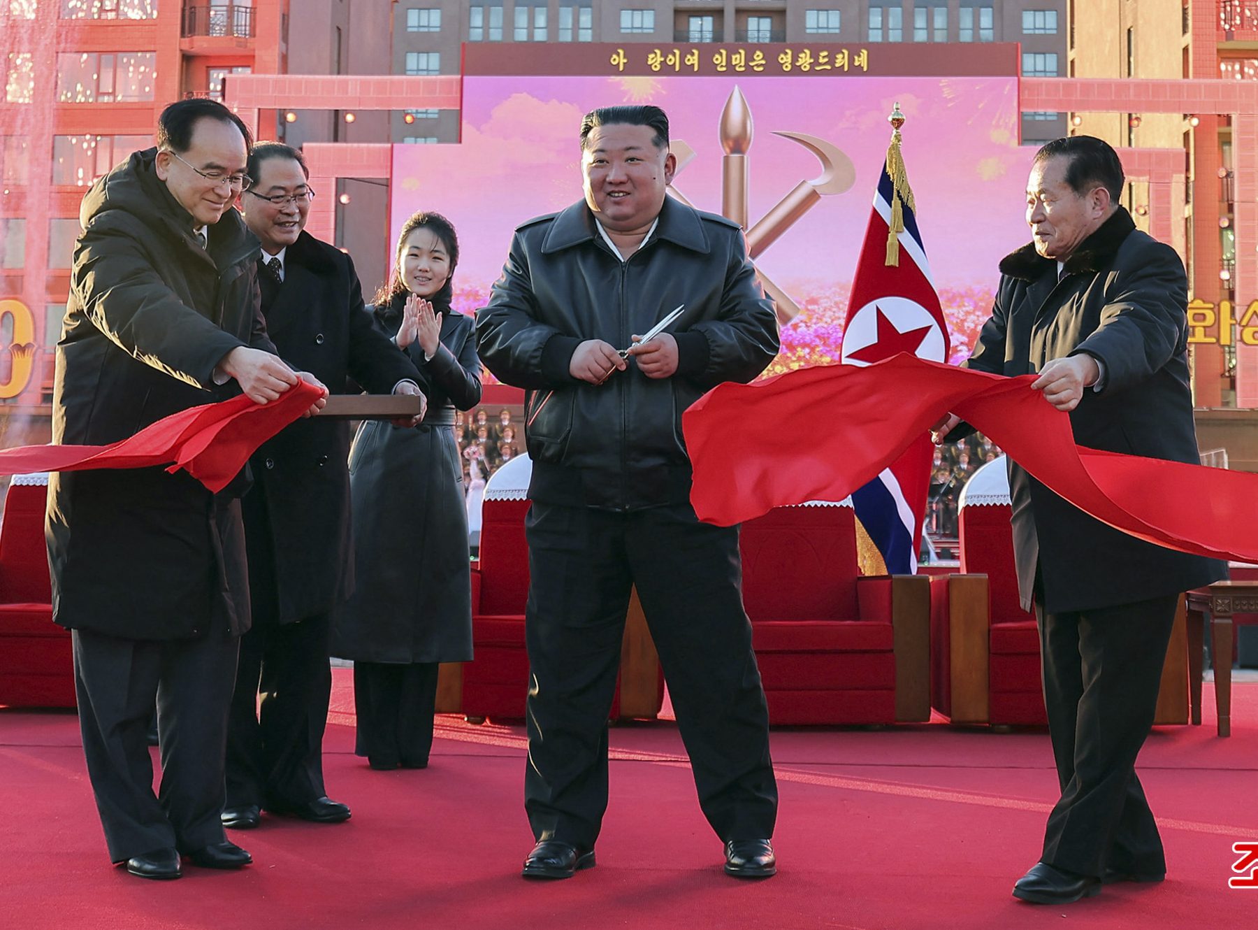 North Korean leader Kim Jong Un (C) and his daughter Ju Ae (center L) attending the inauguration ceremony of 10,000 flats of the fourth stage in Hwasong Area of Pyongyang.