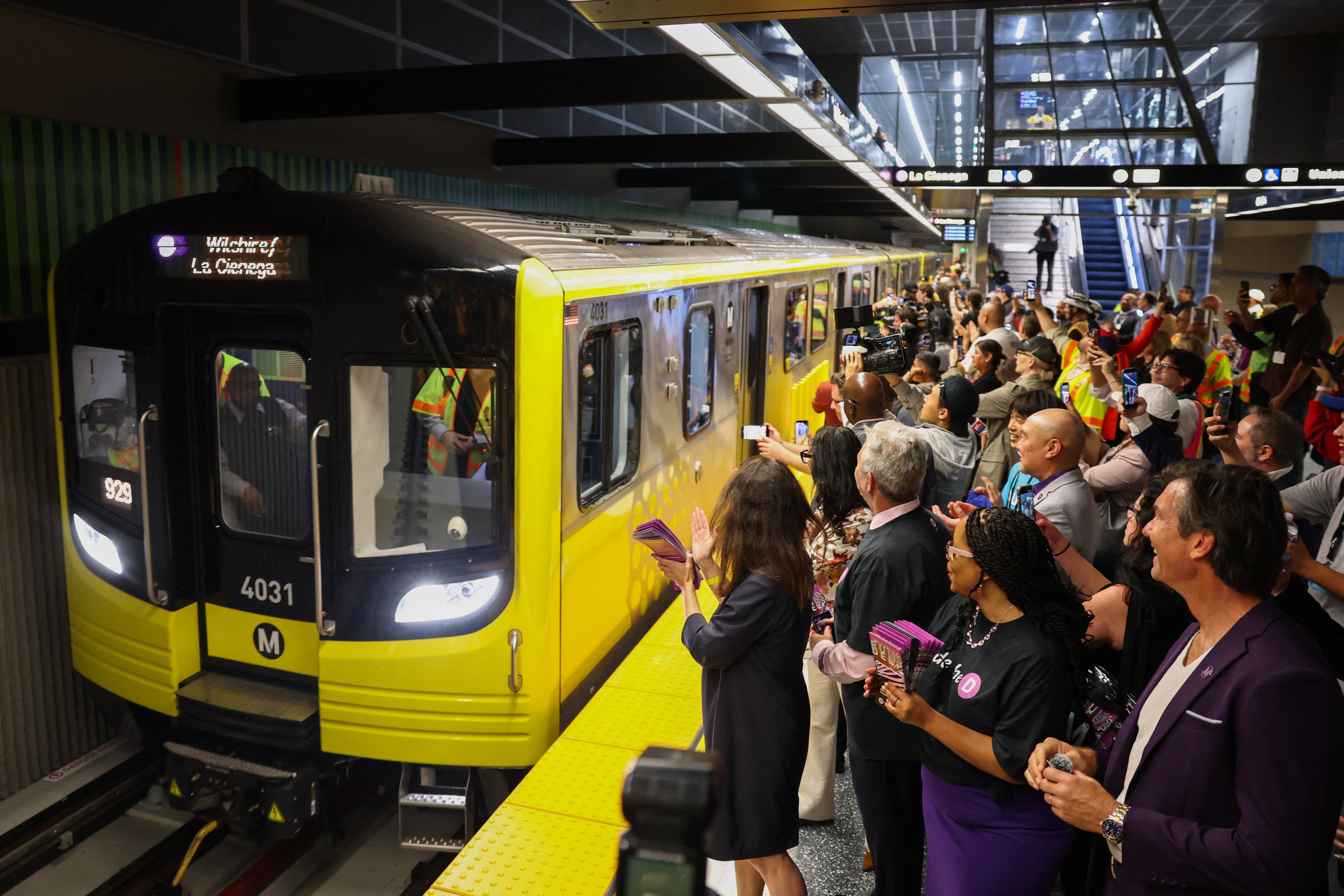 One of the first trains open to the public arrives to the Wilshire/Fairfax station during the opening of the Metro D Line subway extension in Los Angeles on May 8, 2026.