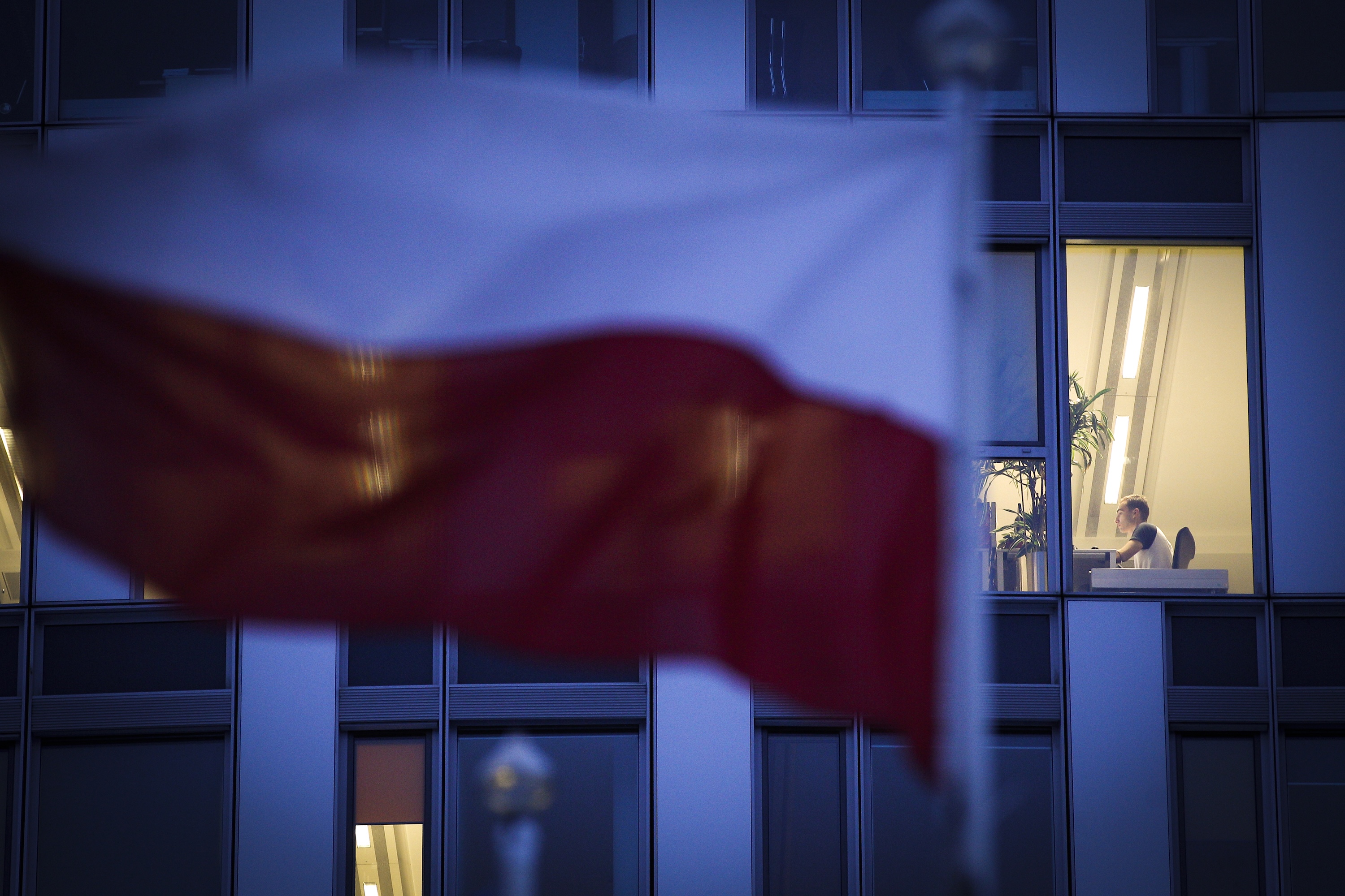 People are seen in the offices of Huawei Poland in Warsaw, Poland on January 12, 2018.