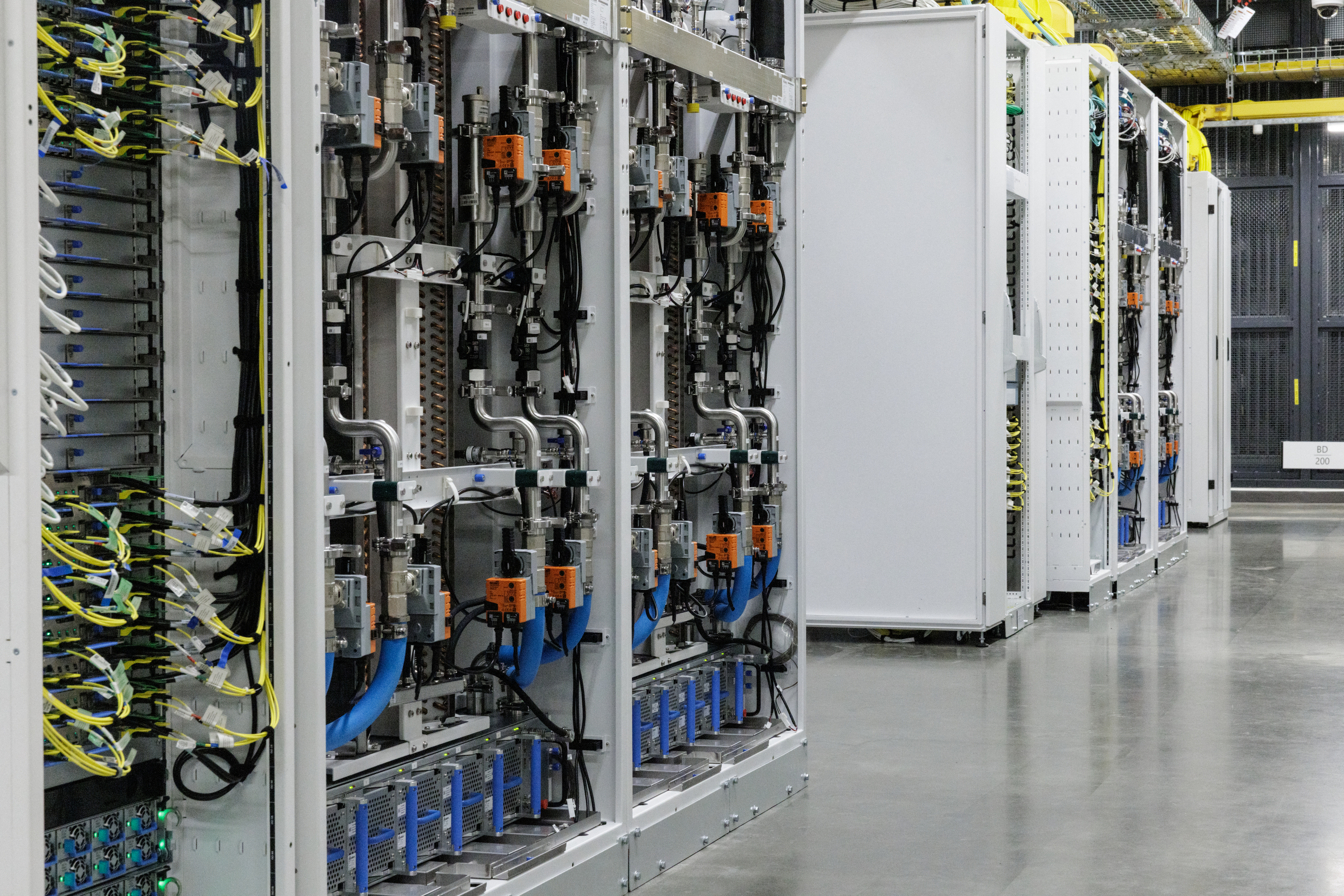 racks of GPUs (graphics processing units) with a closed-loop liquid cooling system are seen inside an operational Microsoft data centre in Karawang, West Java.