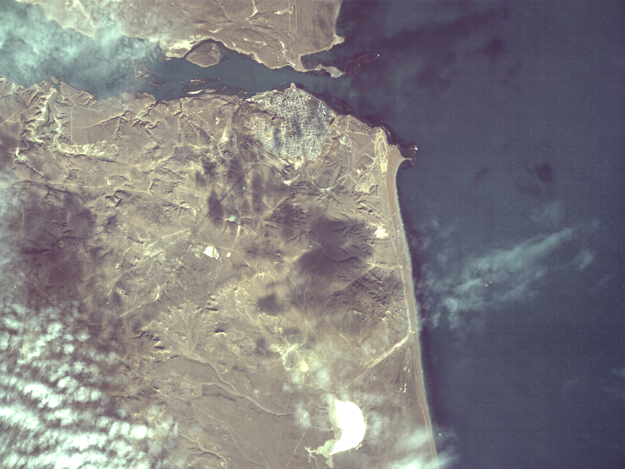 An AI model in space selected this image after being asked to identify a natural environment near a human-developed area.
