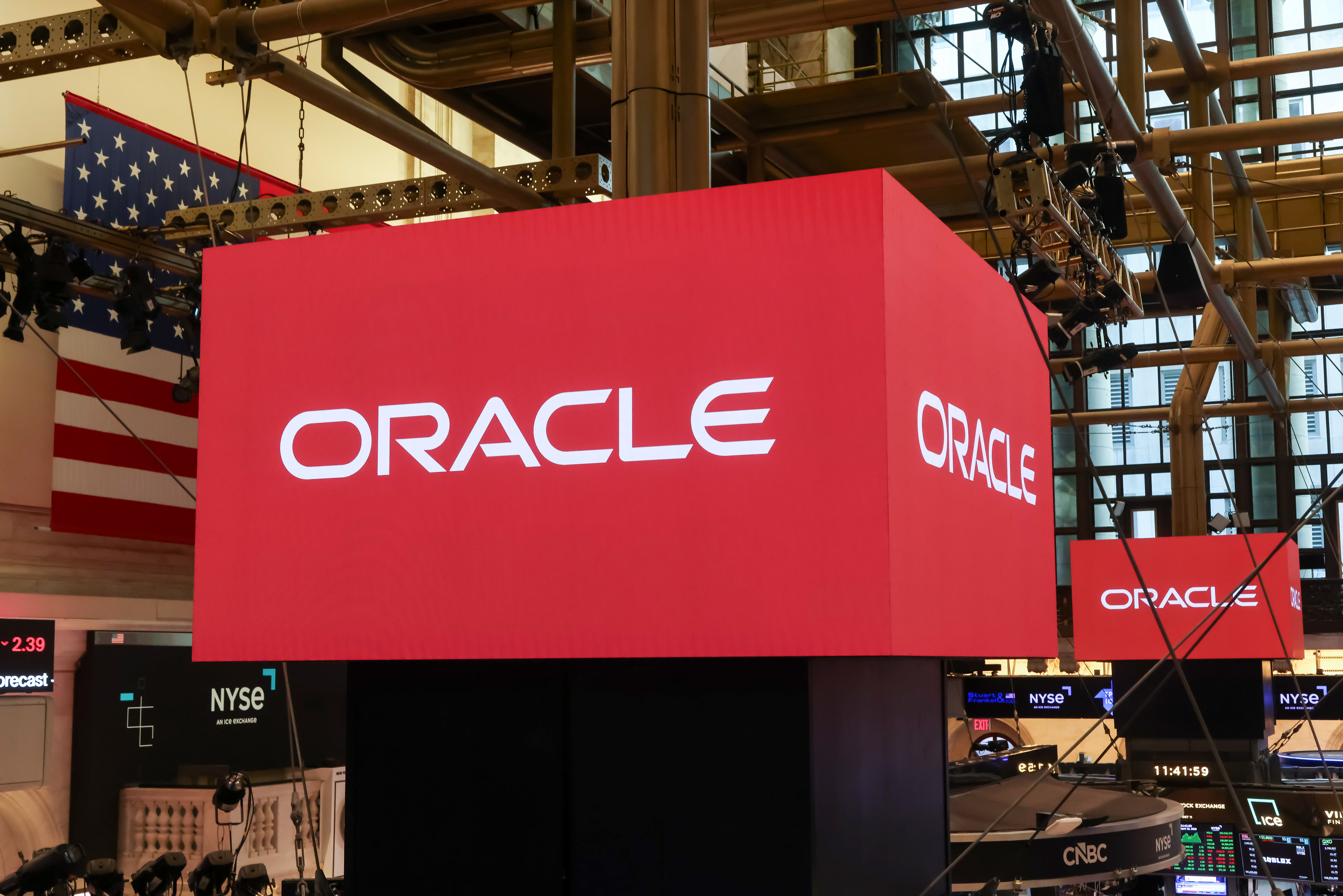 Oracle Corp. signage on the floor of the New York Stock Exchange (NYSE) in New York, US, on Friday, April 10, 2026.