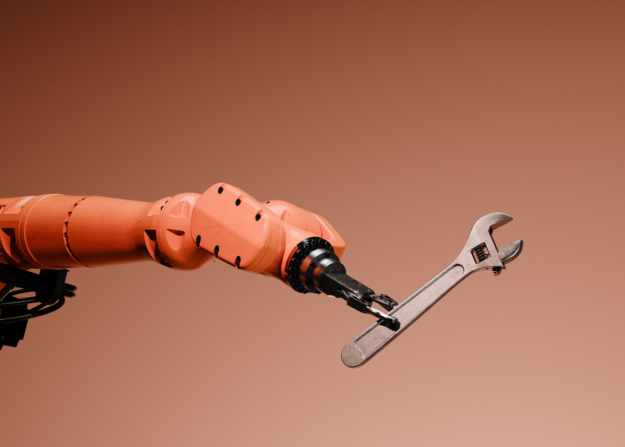 Conceptual image of a robotic arm holding a wrench.